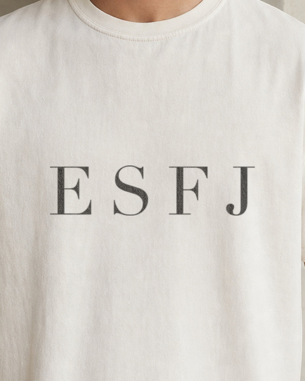 The Typese ESFJ Comfort Colors Tee in cream white, male front detail