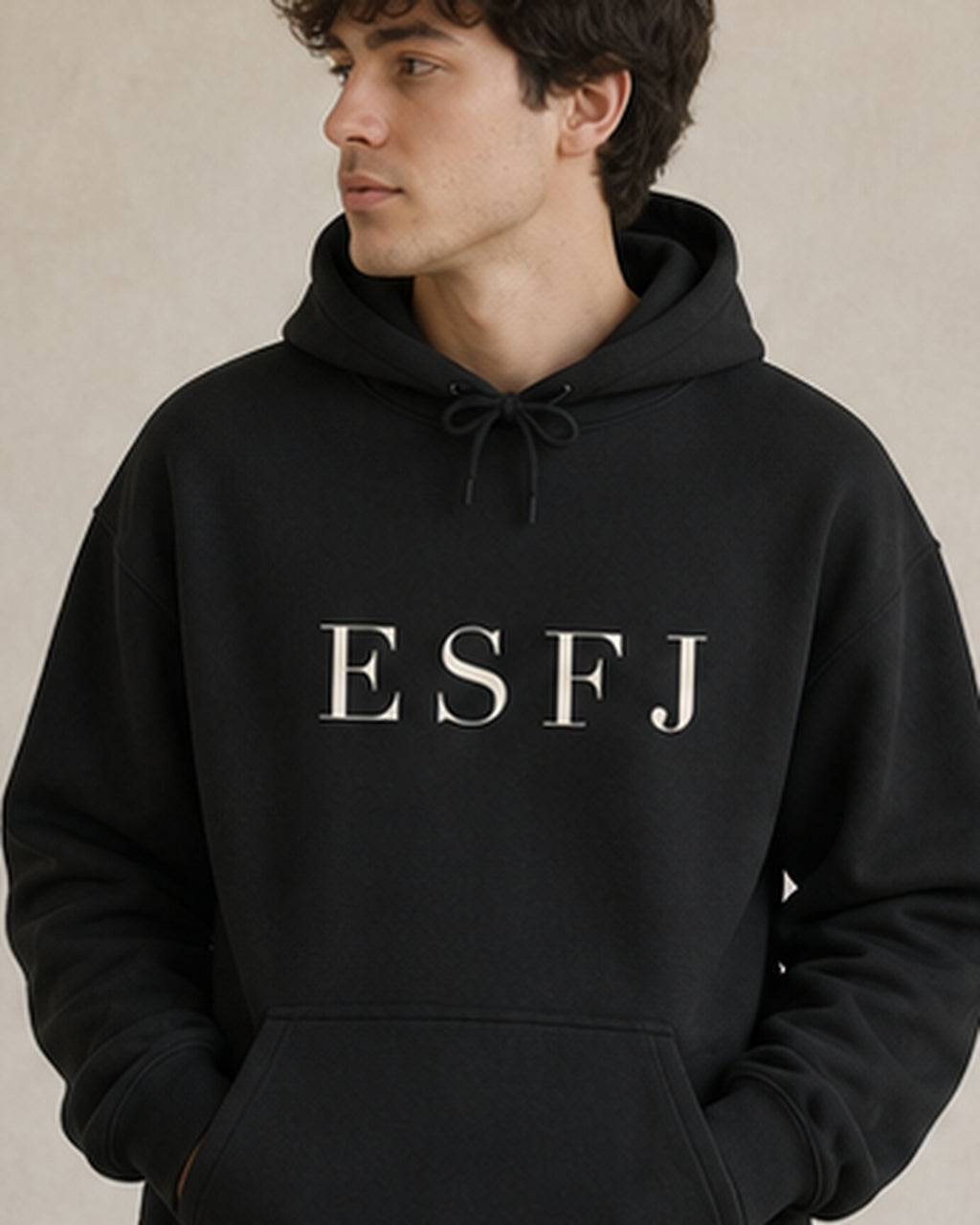 The Typese ESFJ Gildan hoodie in black, male front detail