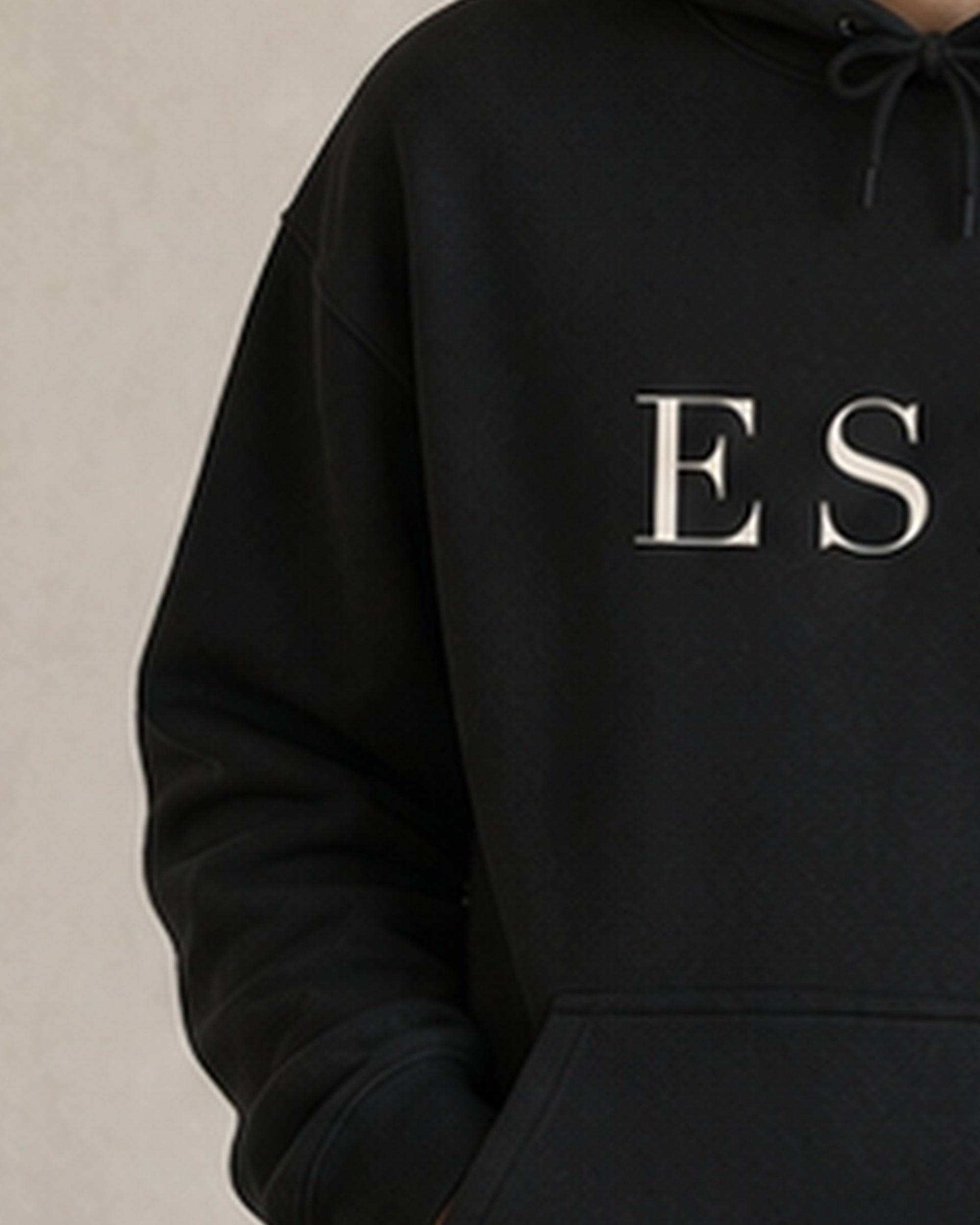 The Typese ESFJ Gildan hoodie in black, sleeve detail