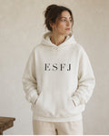 The Typese ESFJ Gildan hoodie in white, female front