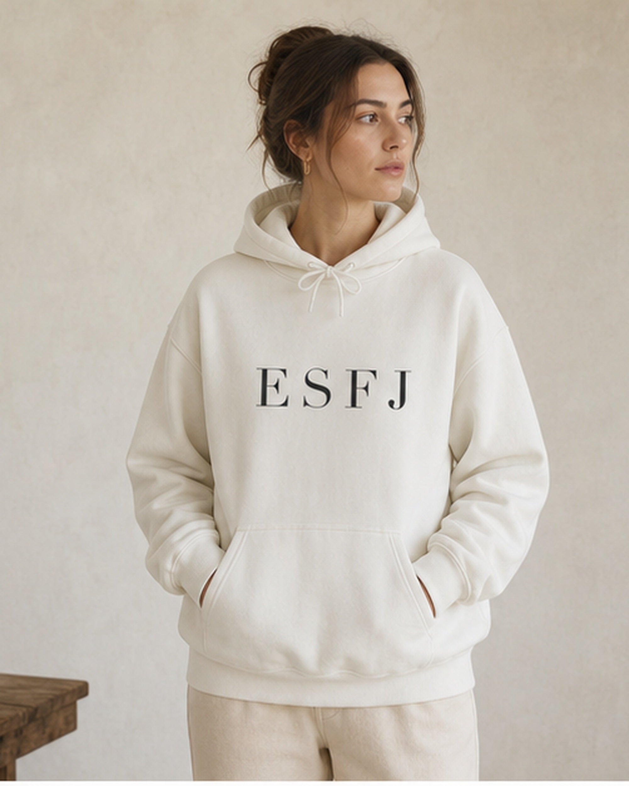 The Typese ESFJ Gildan hoodie in white, female front