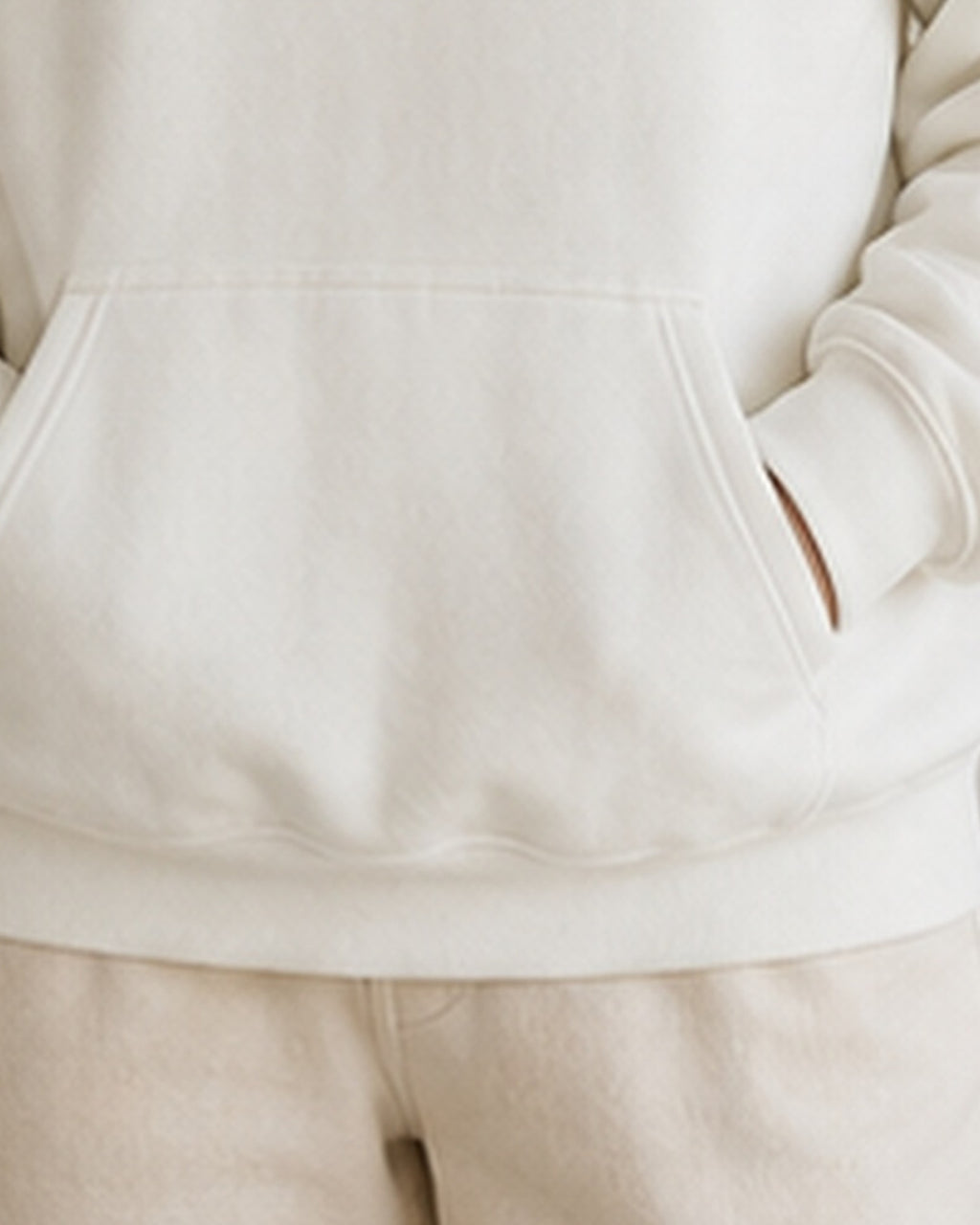 The Typese ESFJ Gildan hoodie in white, hem pocket detail