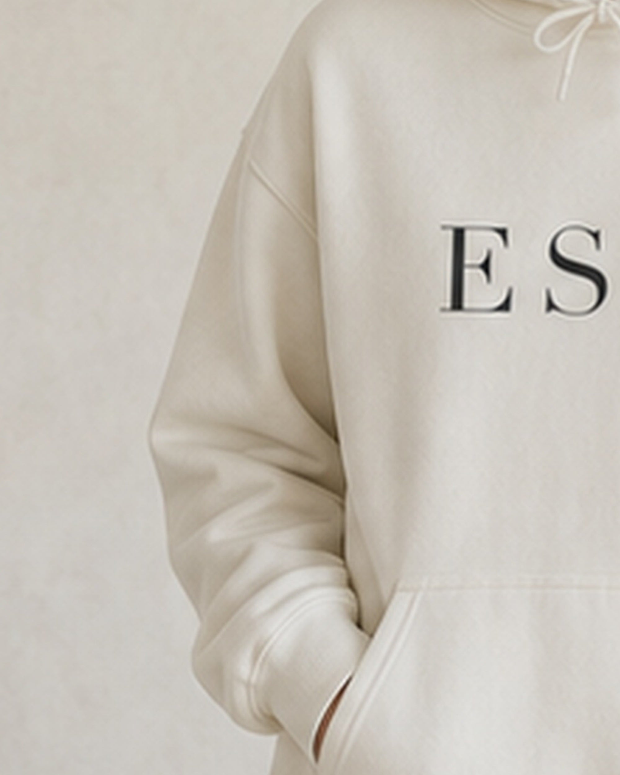 The Typese ESFJ Gildan hoodie in white, sleeve detail