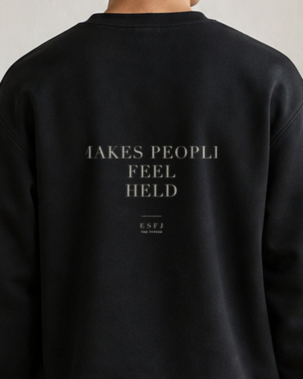 The Typese ESFJ Gildan crewneck sweatshirt in black, male back detail
