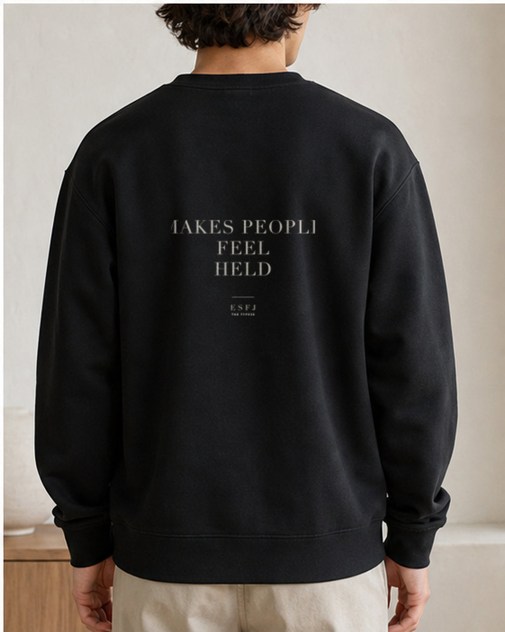The Typese ESFJ Gildan crewneck sweatshirt in black, male back