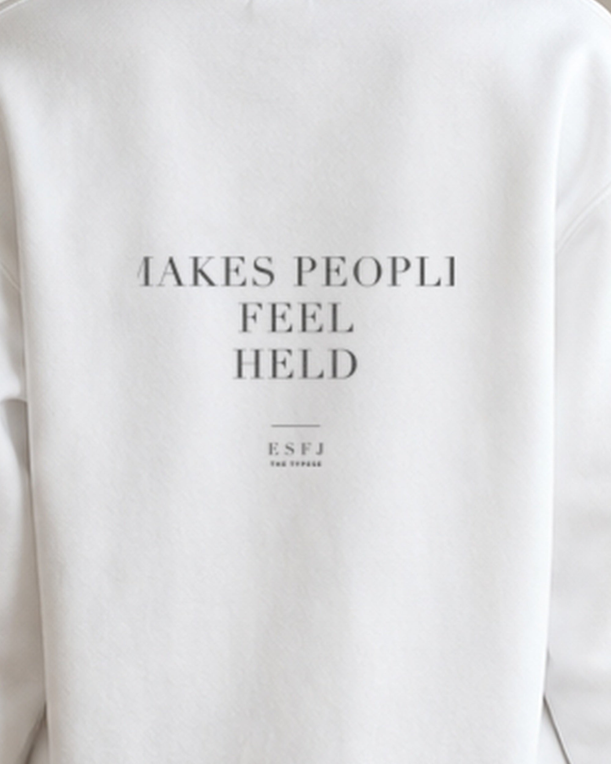 The Typese ESFJ Gildan crewneck sweatshirt in white, female back print close