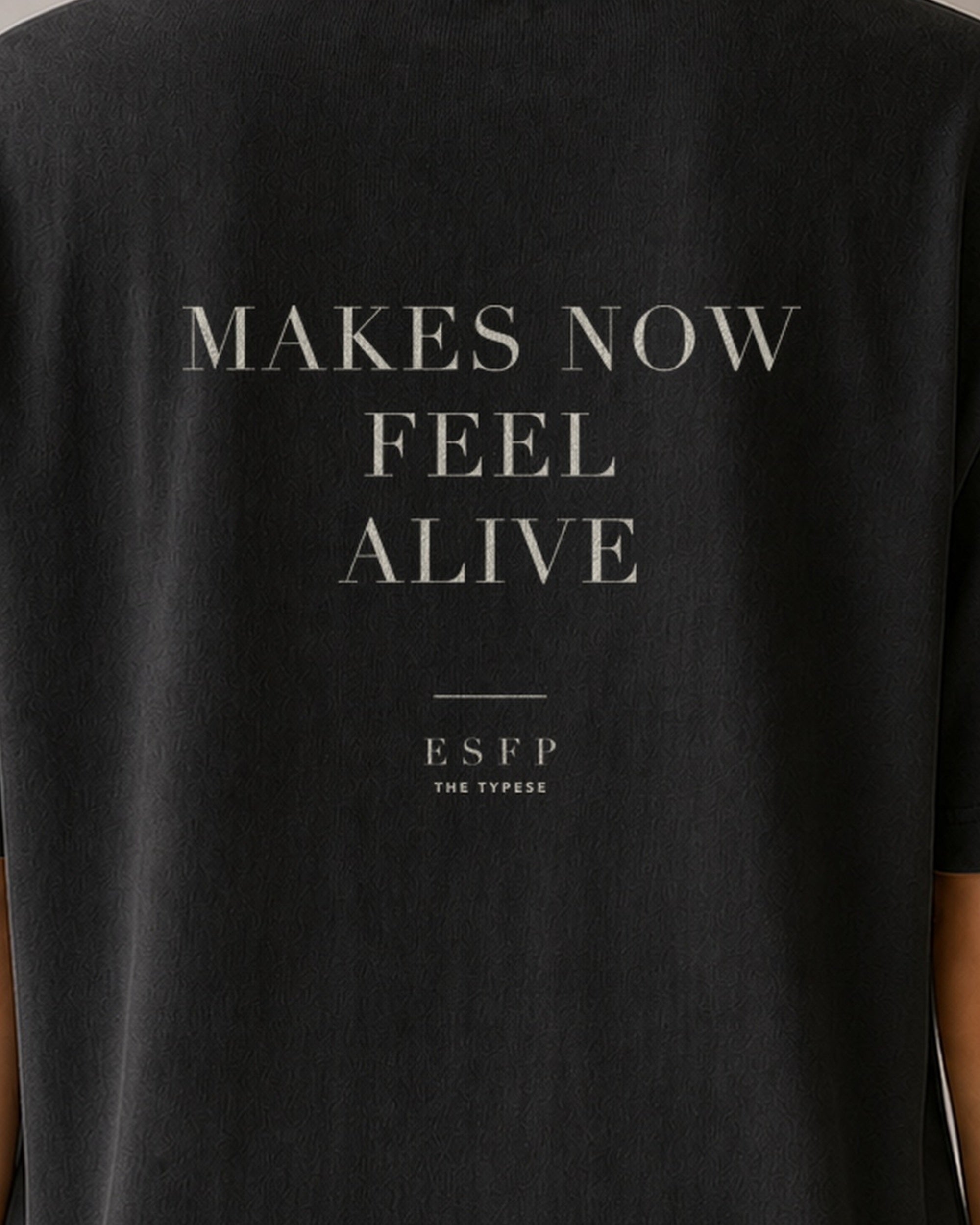 The Typese ESFP Comfort Colors Tee in black, female back detail
