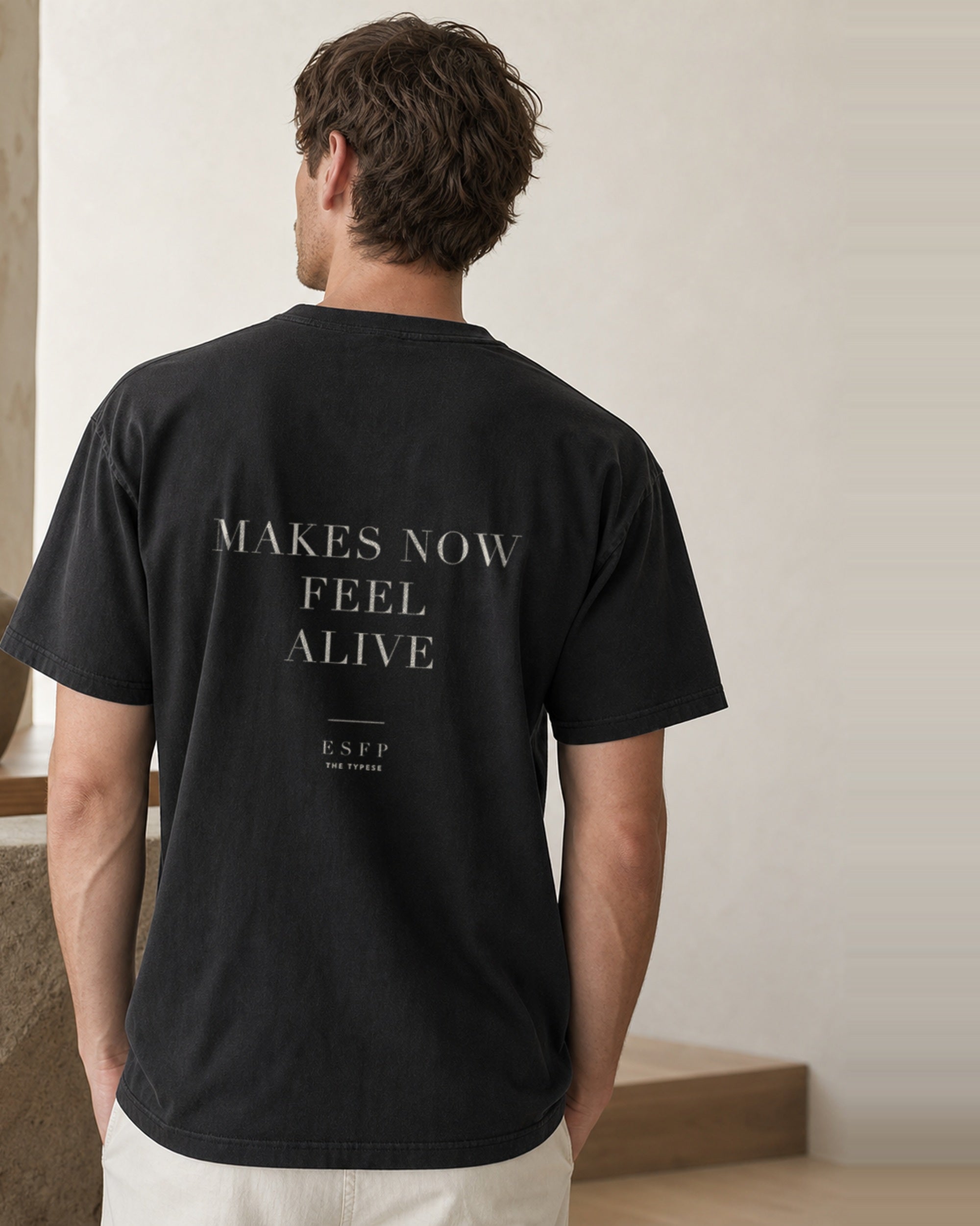 The Typese ESFP Comfort Colors Tee in black, male back