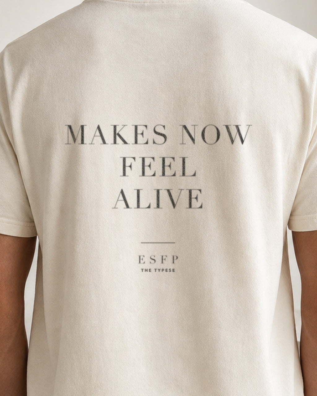 The Typese ESFP Comfort Colors Tee in cream white, male back detail