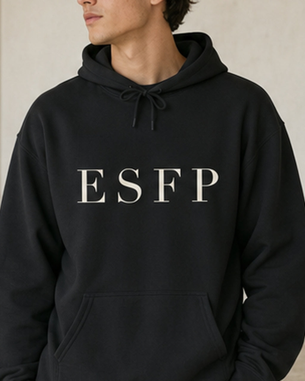 The Typese ESFP Gildan hoodie in black, male front detail