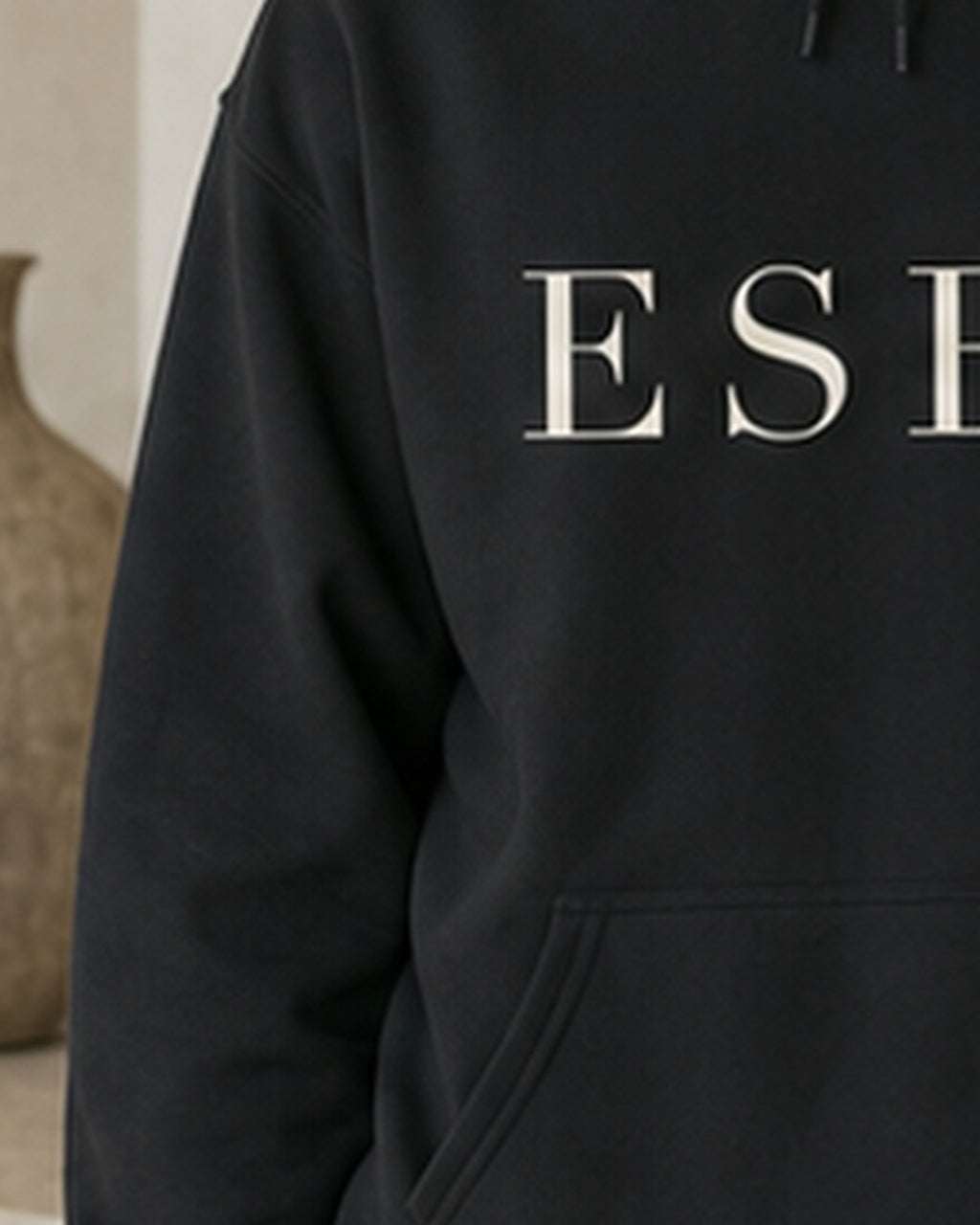 The Typese ESFP Gildan hoodie in black, sleeve detail