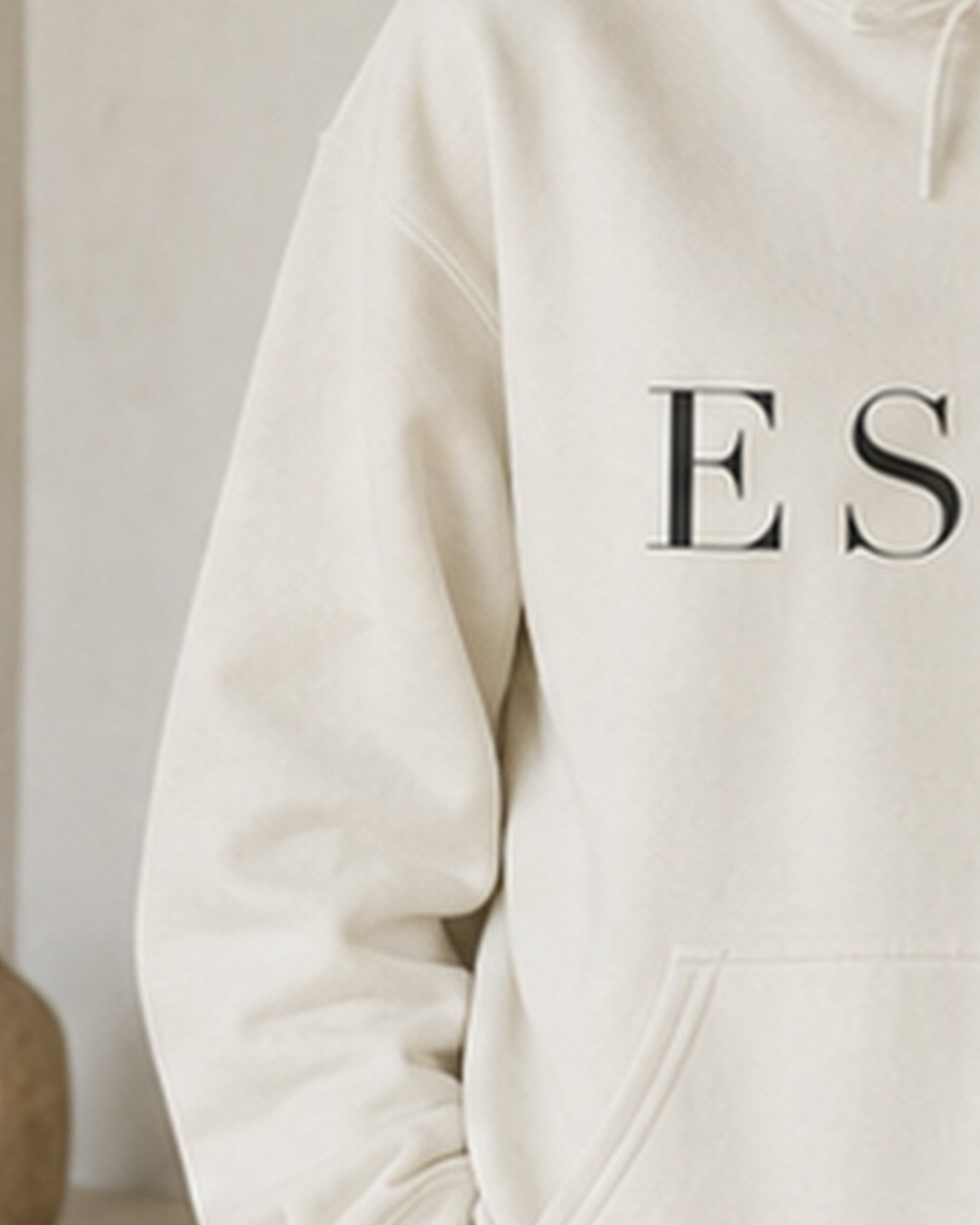The Typese ESFP Gildan hoodie in white, sleeve detail
