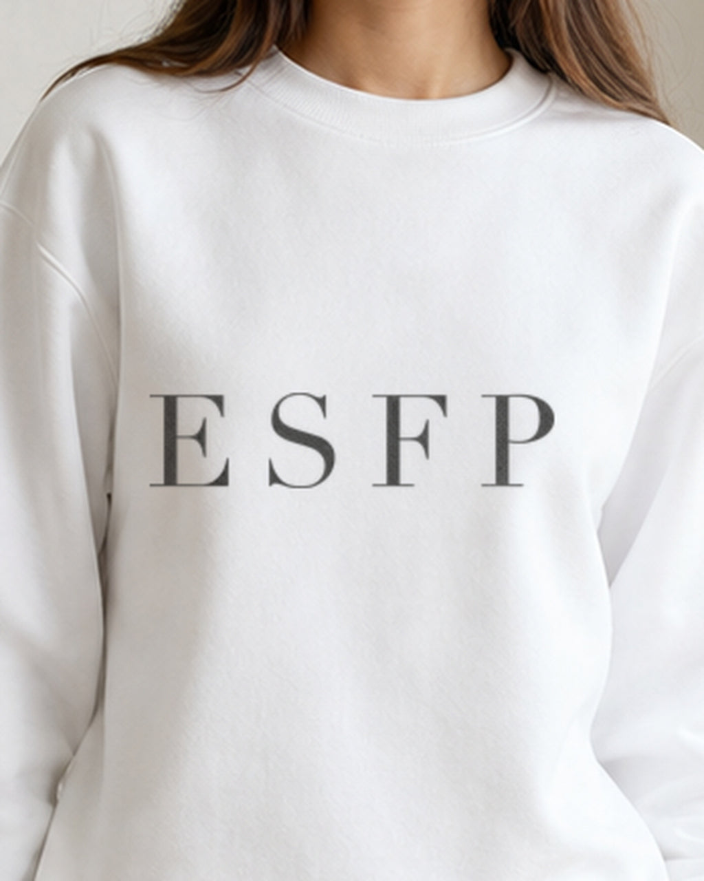 The Typese ESFP Gildan crewneck sweatshirt in white, female front detail
