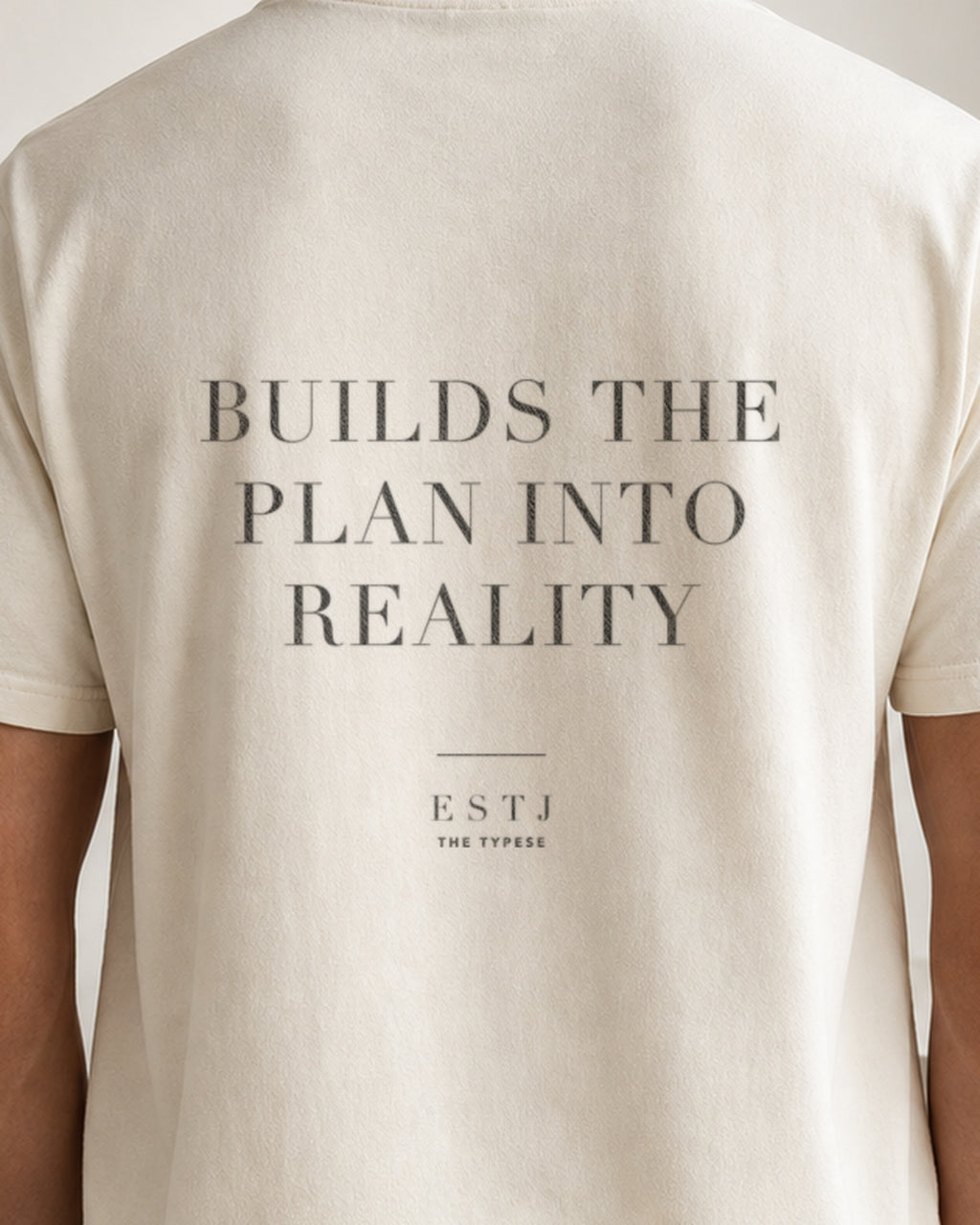 The Typese ESTJ Comfort Colors Tee in cream white, male back detail