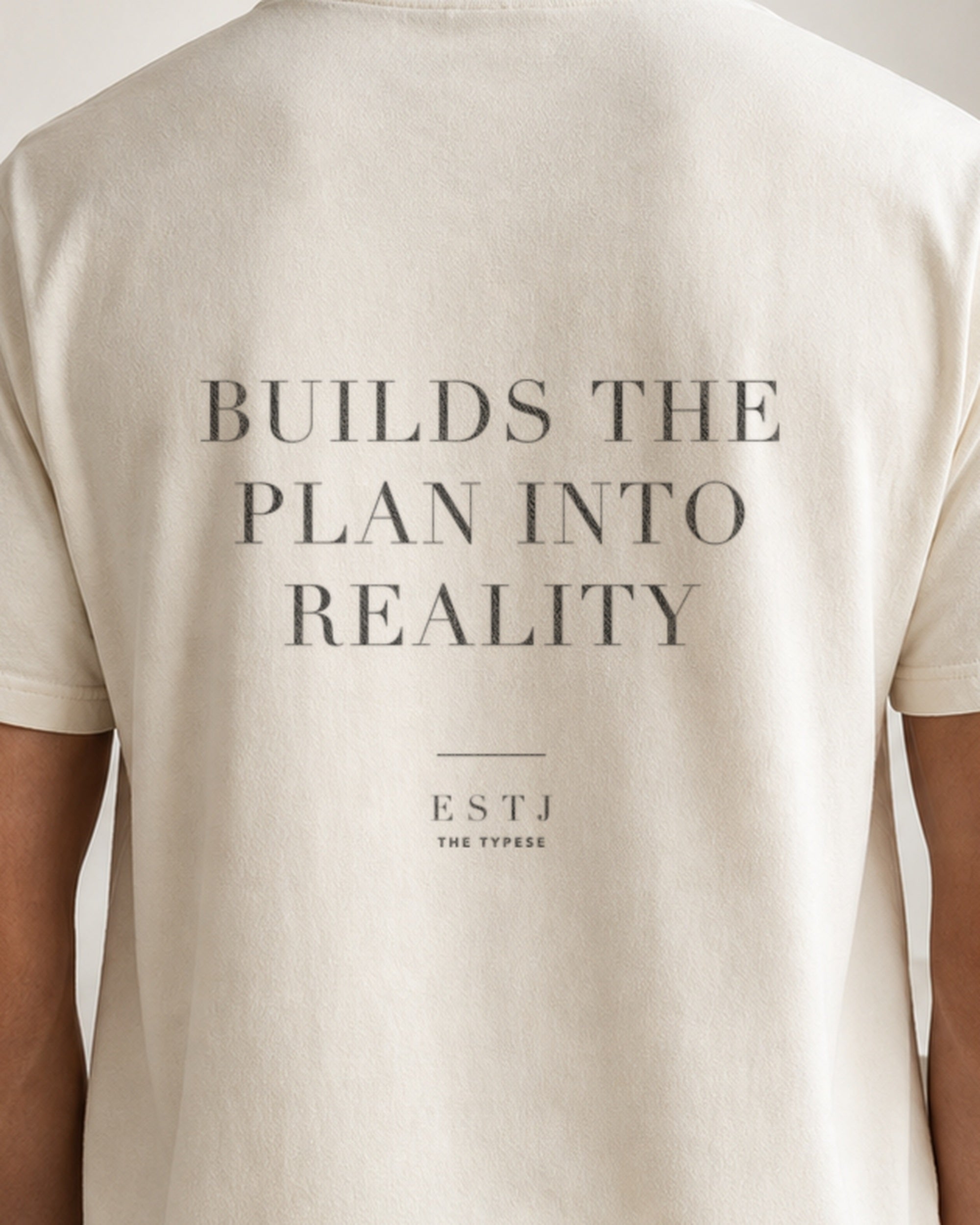 The Typese ESTJ Comfort Colors Tee in cream white, male back detail