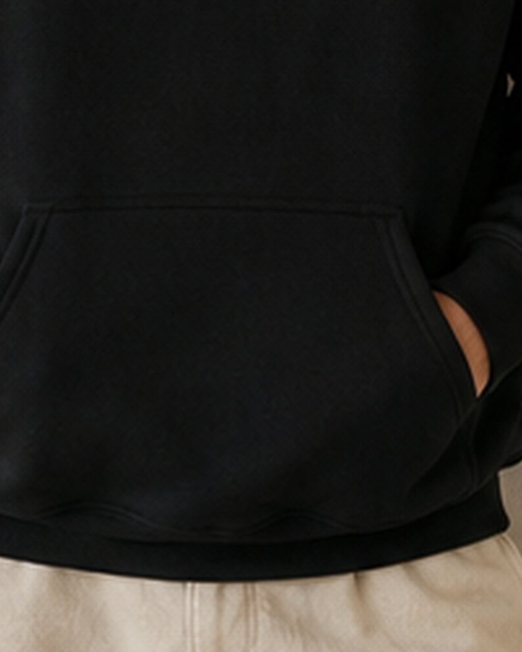 The Typese ESTJ Gildan hoodie in black, hem pocket detail