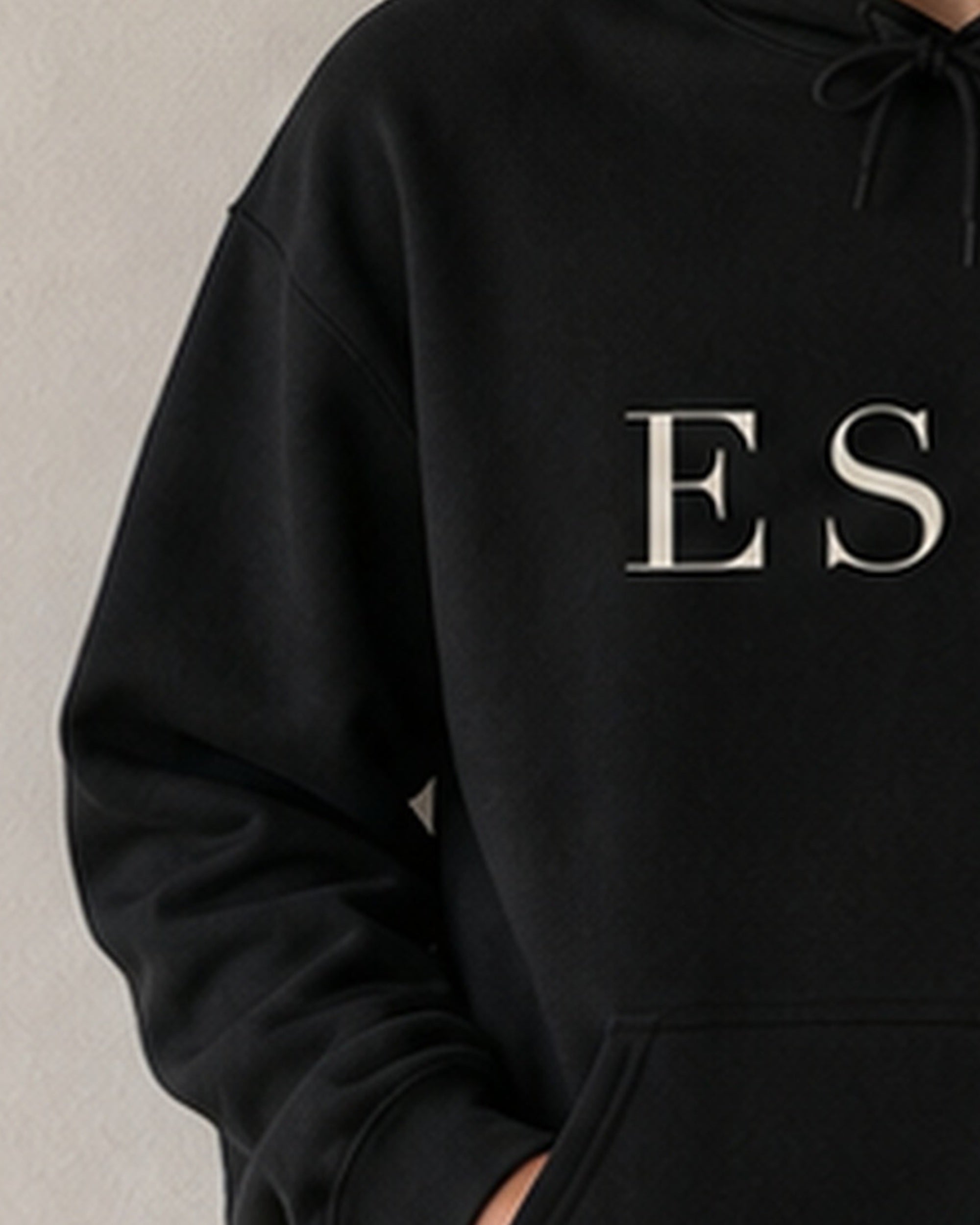 The Typese ESTJ Gildan hoodie in black, sleeve detail