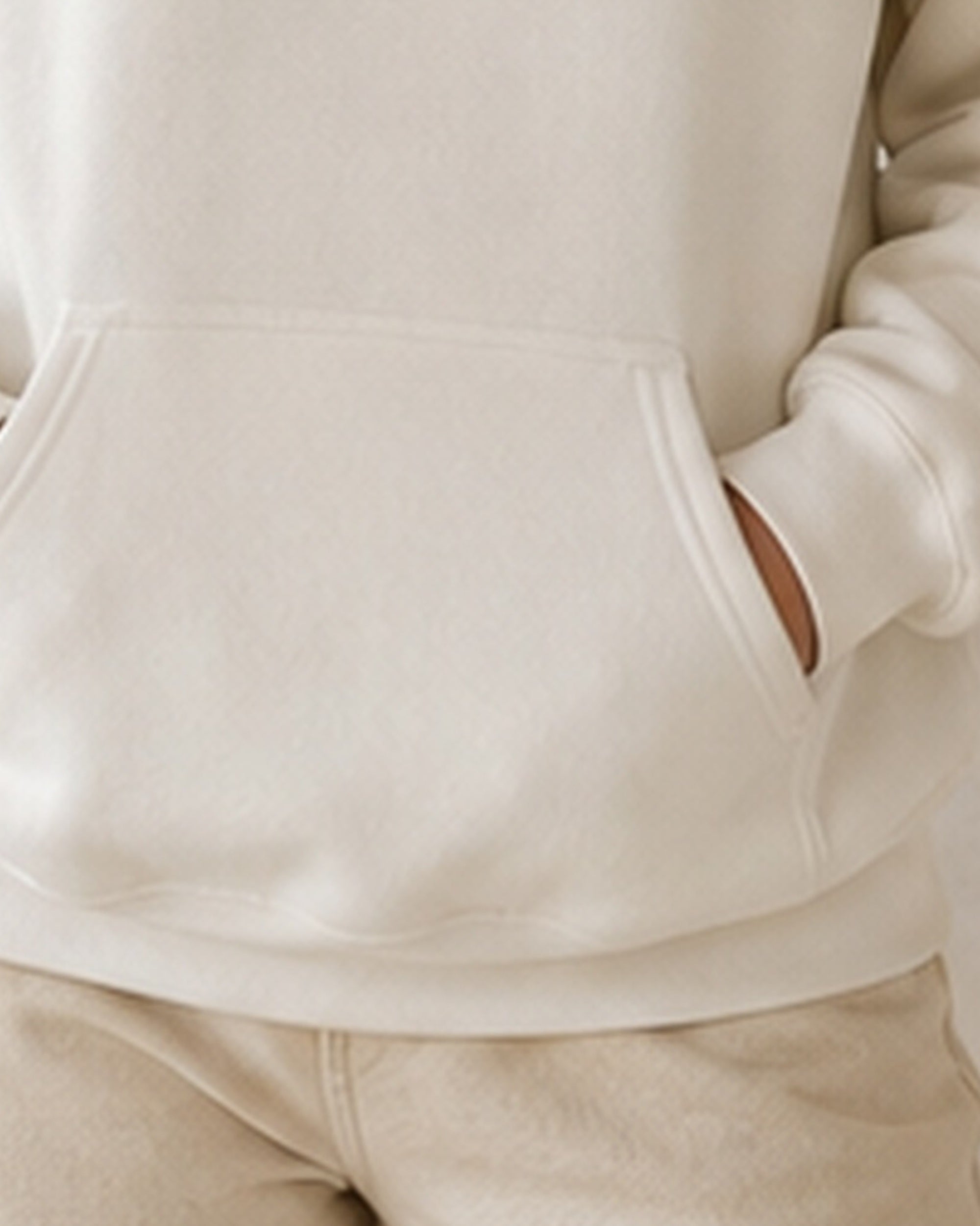 The Typese ESTJ Gildan hoodie in white, hem pocket detail