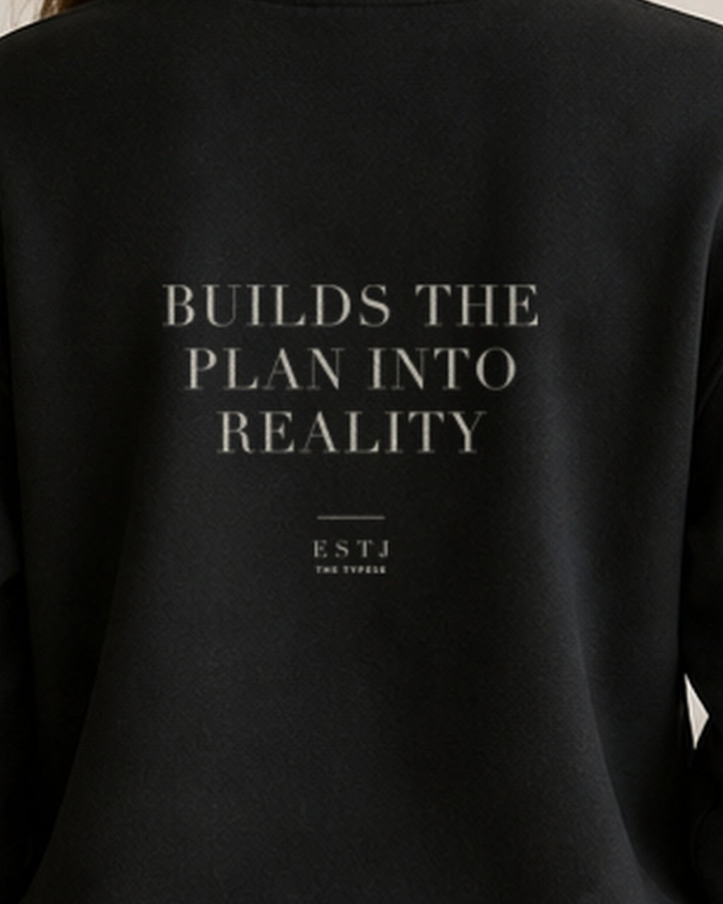 The Typese ESTJ Gildan crewneck sweatshirt in black, female back print close