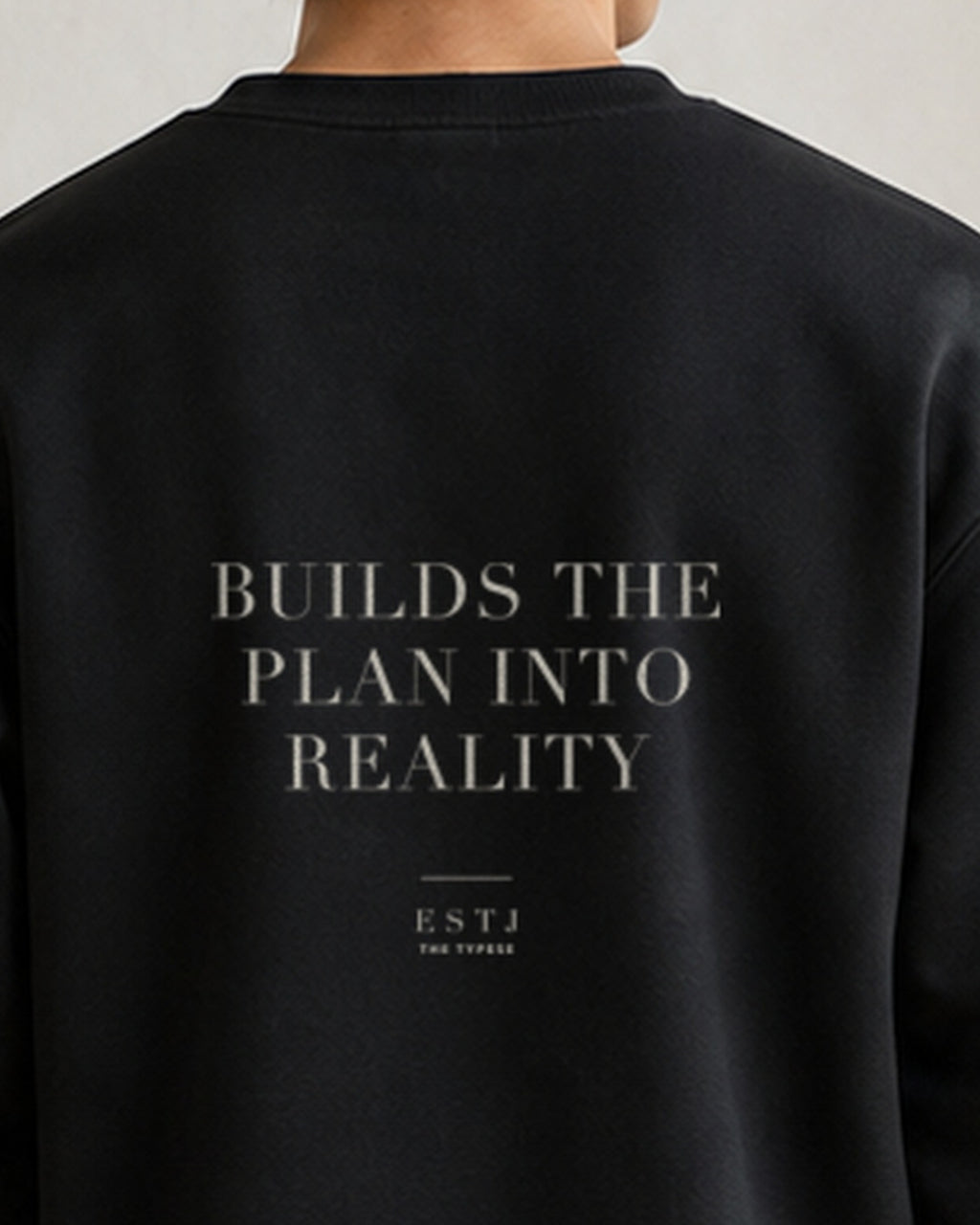 The Typese ESTJ Gildan crewneck sweatshirt in black, male back neckline print