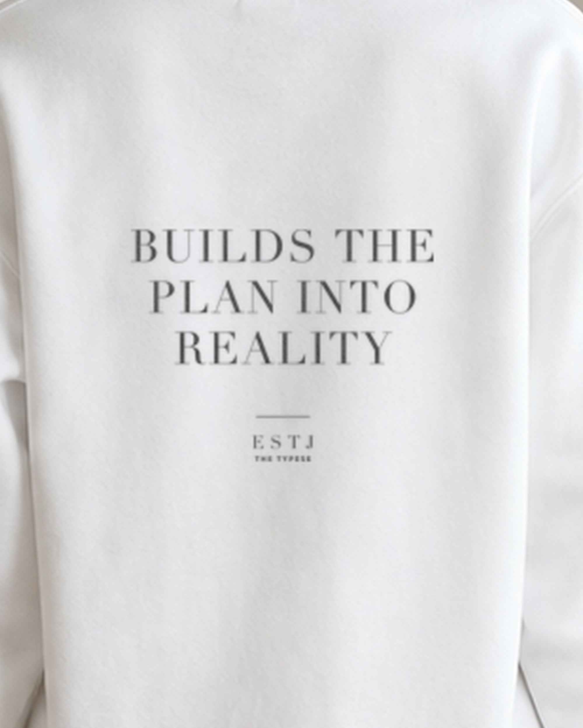 The Typese ESTJ Gildan crewneck sweatshirt in white, female back print close