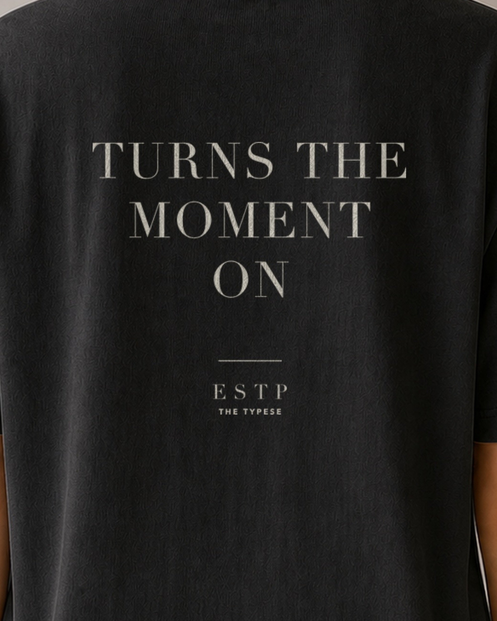The Typese ESTP Comfort Colors Tee in black, female back detail