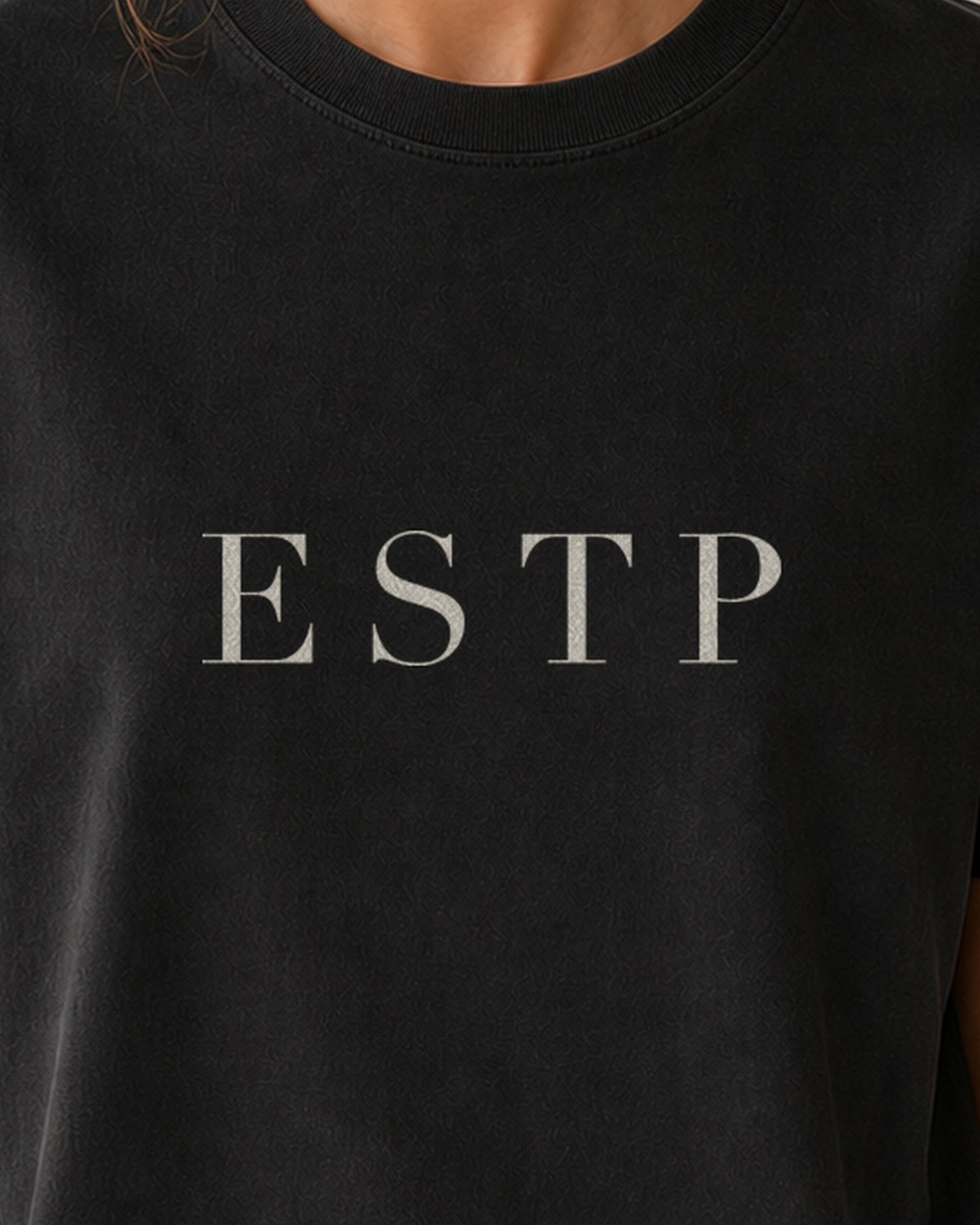 The Typese ESTP Comfort Colors Tee in black, female front detail
