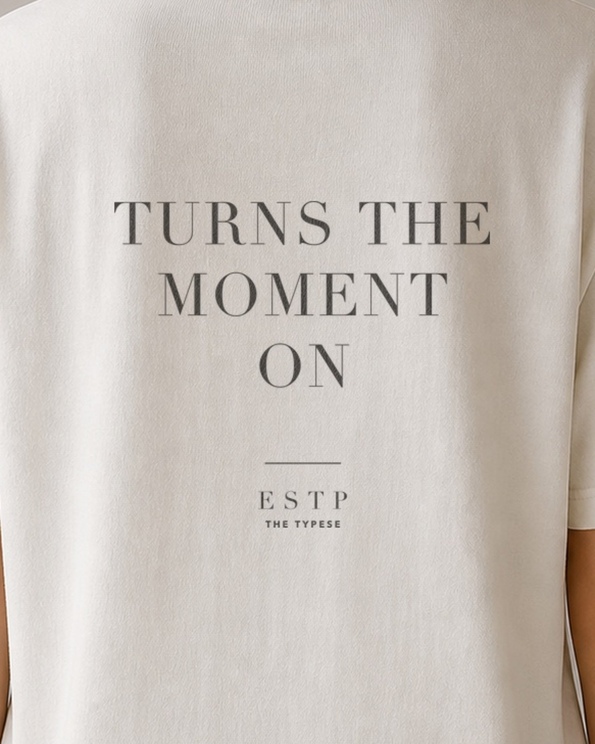 The Typese ESTP Comfort Colors Tee in cream white, female back detail