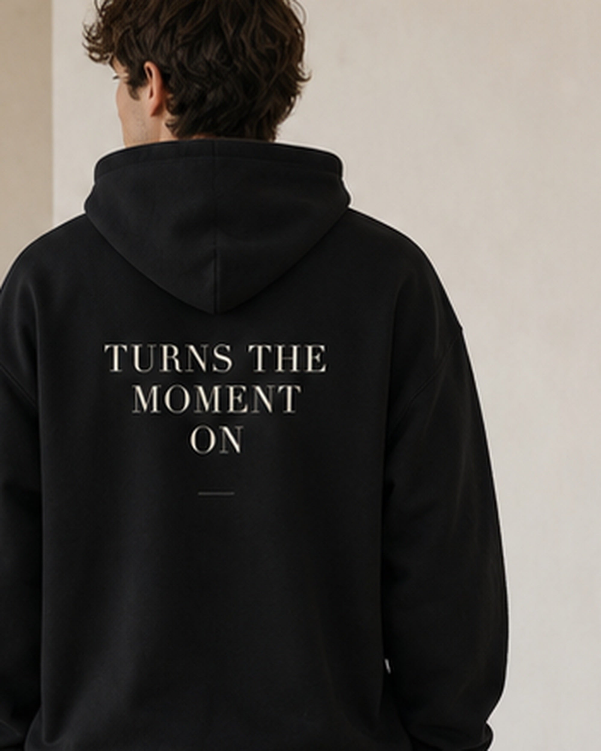 The Typese ESTP Gildan hoodie in black, male back detail