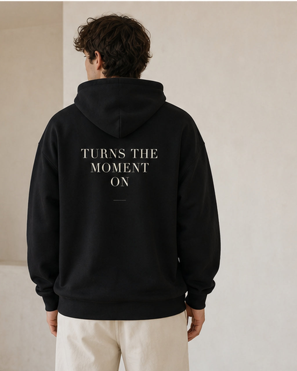 The Typese ESTP Gildan hoodie in black, male back