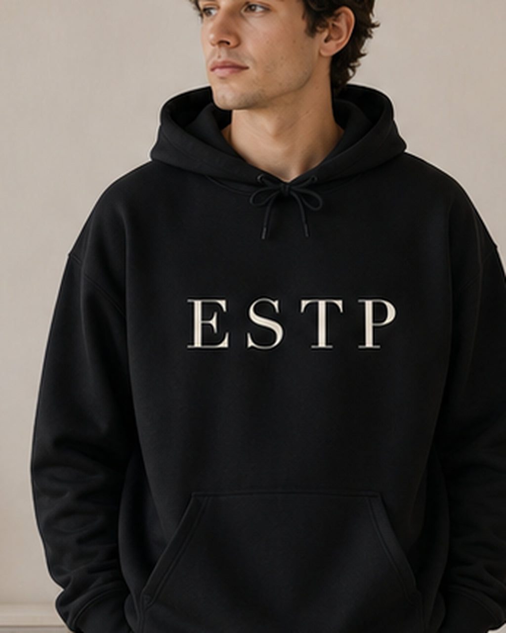 The Typese ESTP Gildan hoodie in black, male front detail