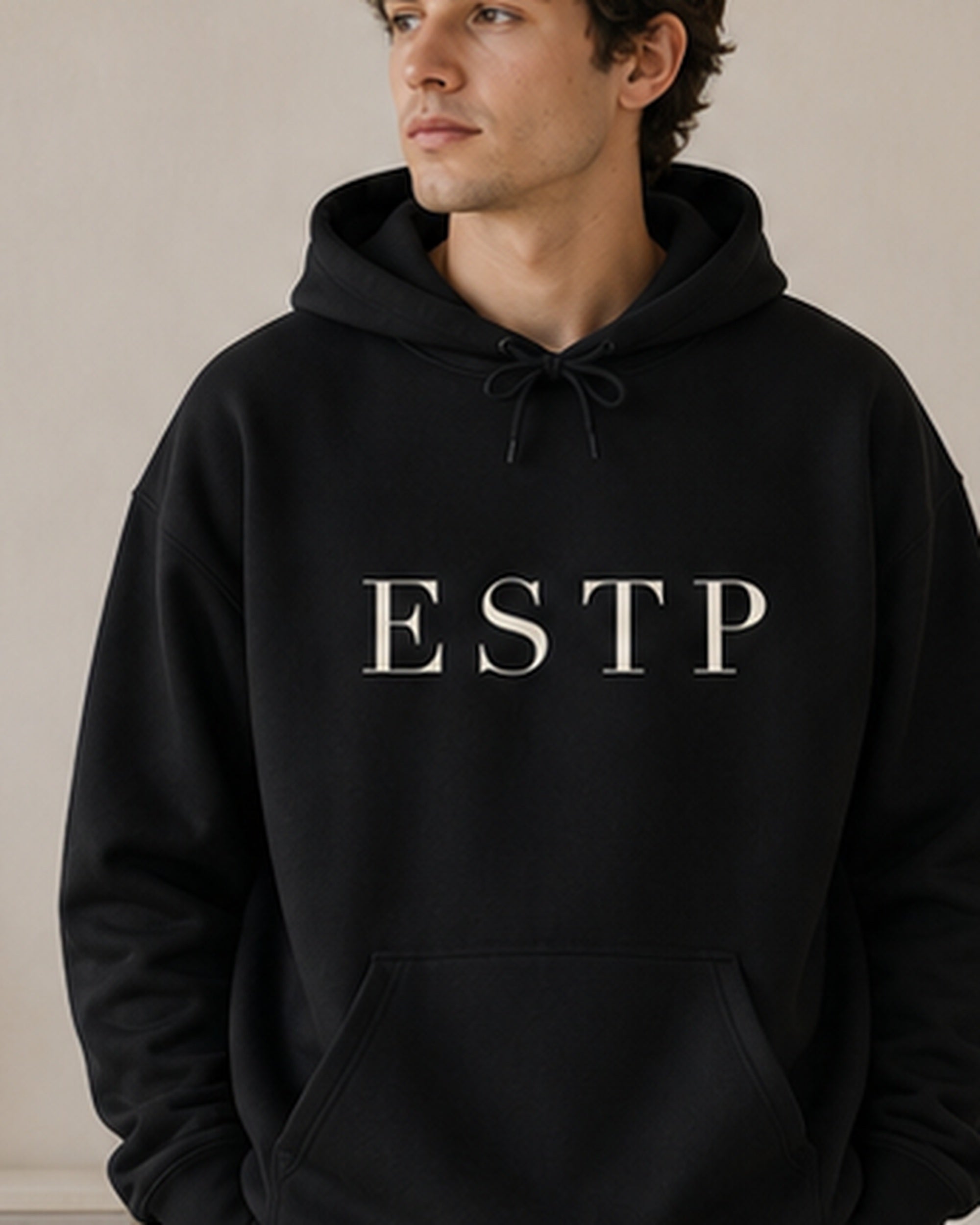 The Typese ESTP Gildan hoodie in black, male front detail