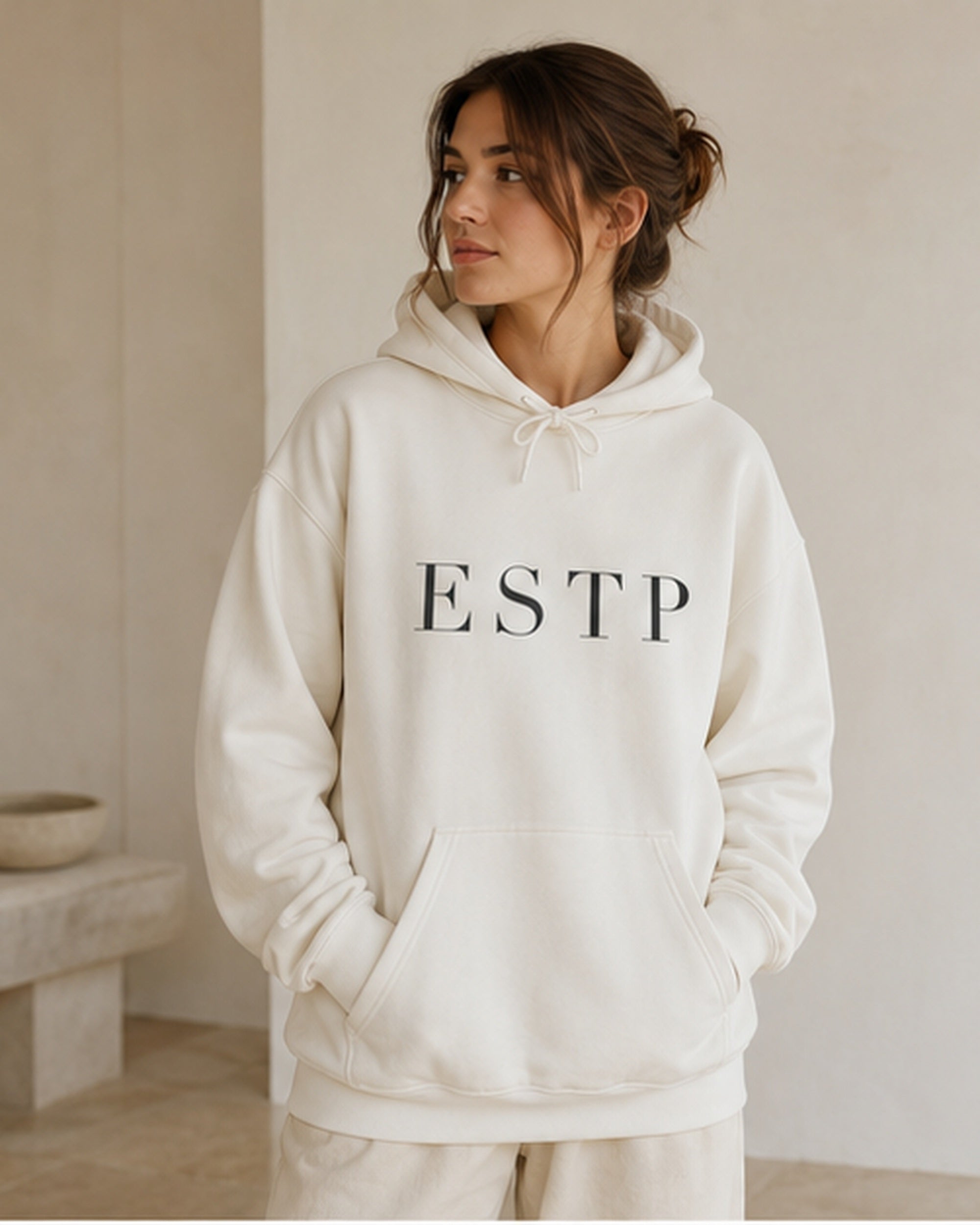 The Typese ESTP Gildan hoodie in white, female front
