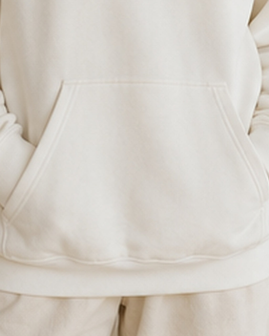 The Typese ESTP Gildan hoodie in white, hem pocket detail