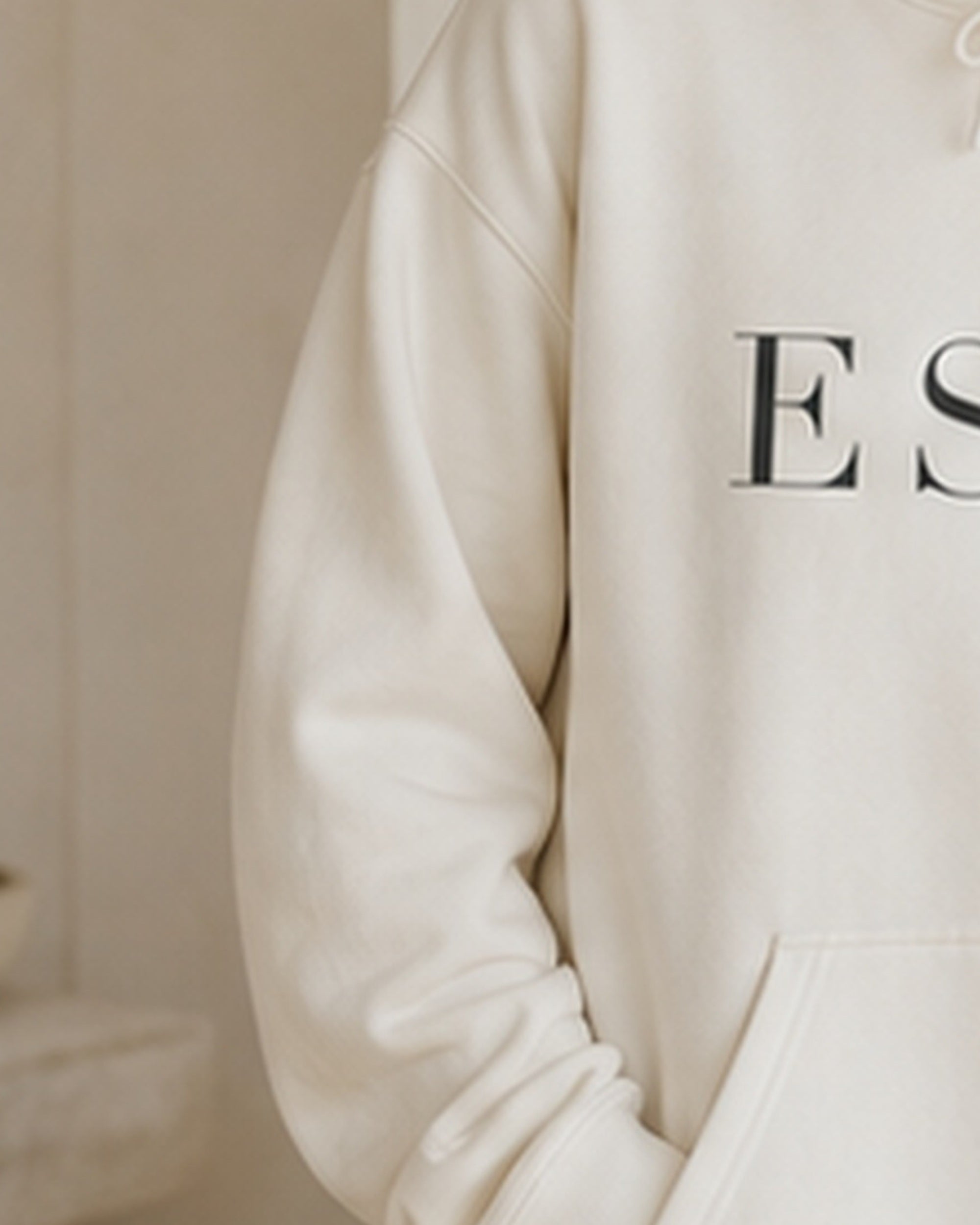 The Typese ESTP Gildan hoodie in white, sleeve detail