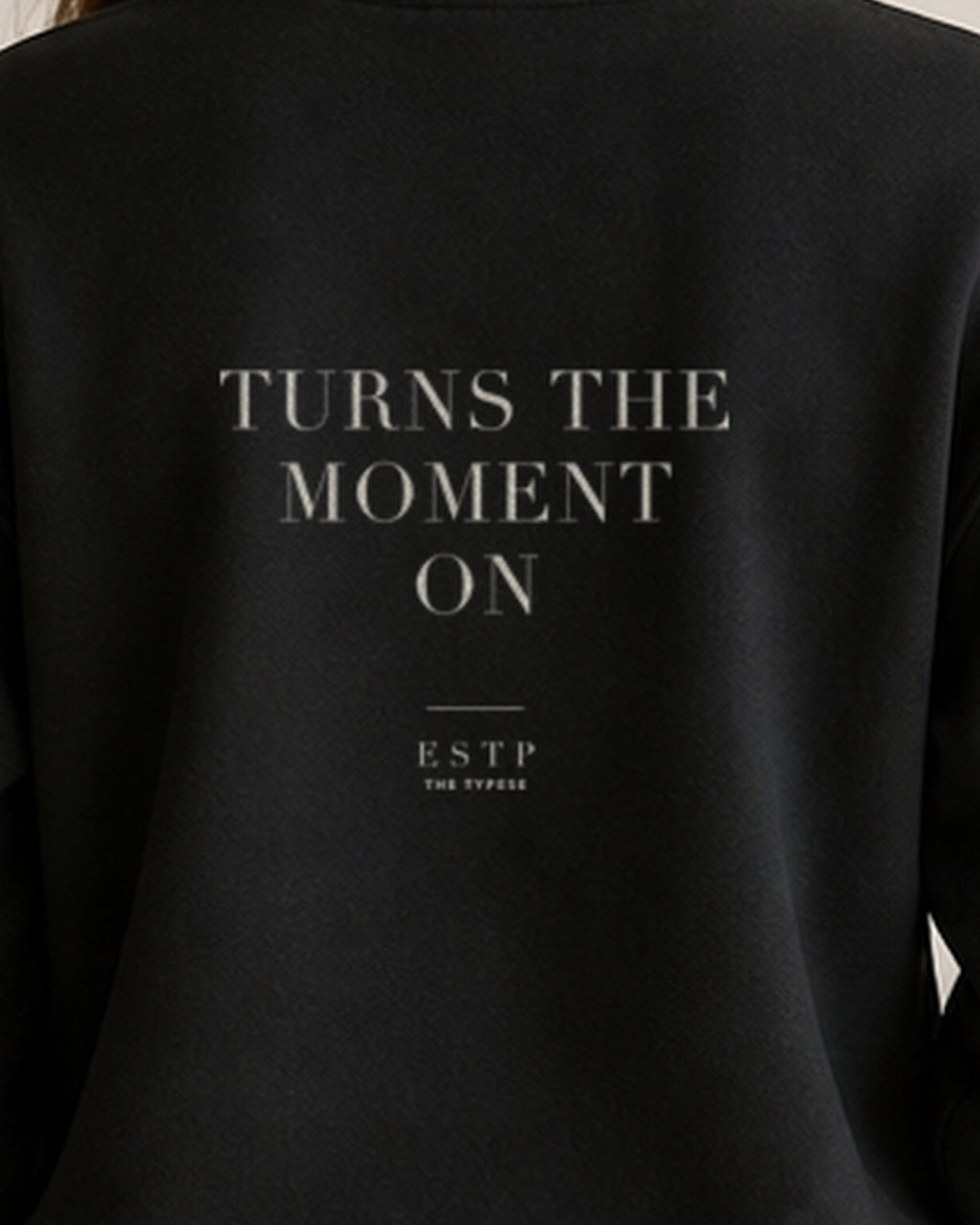 The Typese ESTP Gildan crewneck sweatshirt in black, female back print close