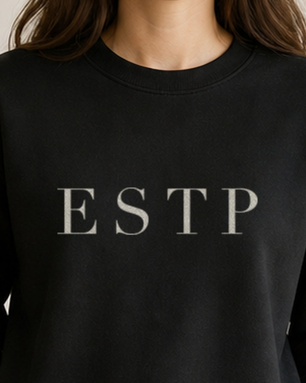 The Typese ESTP Gildan crewneck sweatshirt in black, female front neckline fabric