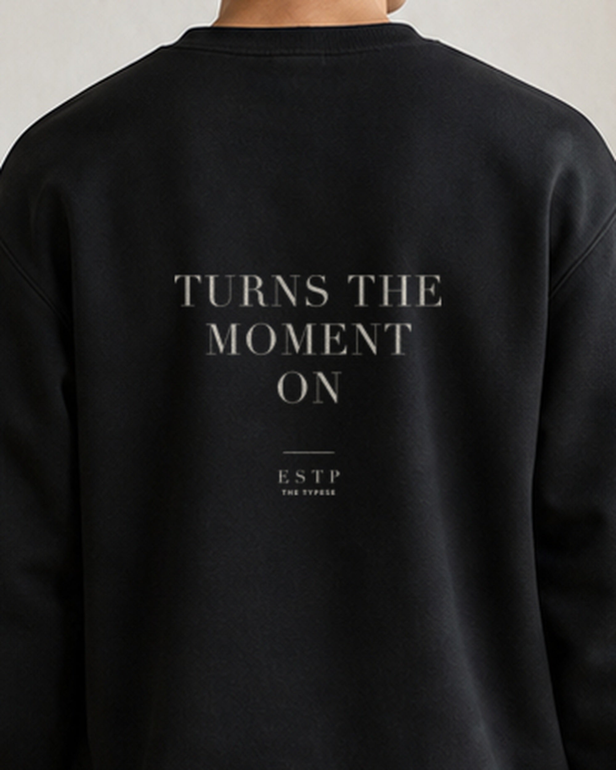 The Typese ESTP Gildan crewneck sweatshirt in black, male back detail