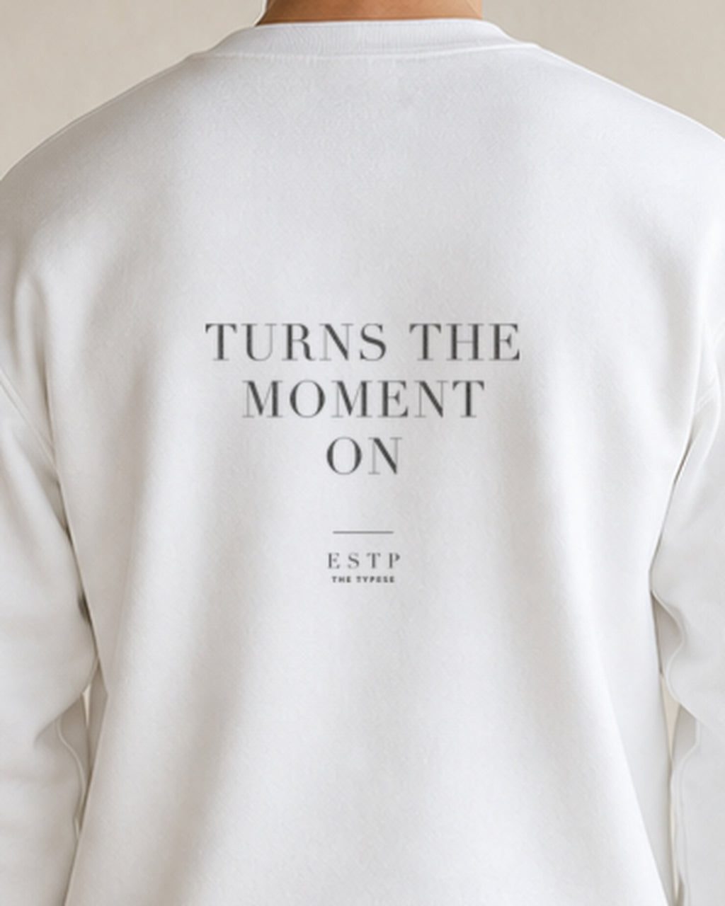 The Typese ESTP Gildan crewneck sweatshirt in white, male back detail