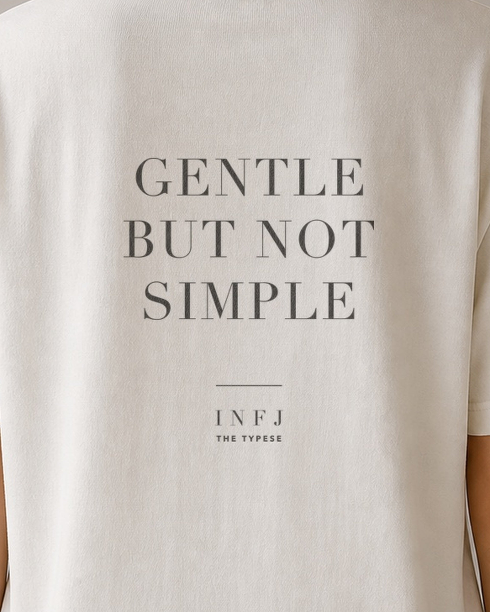 The Typese INFJ Comfort Colors Tee in cream white, female back detail