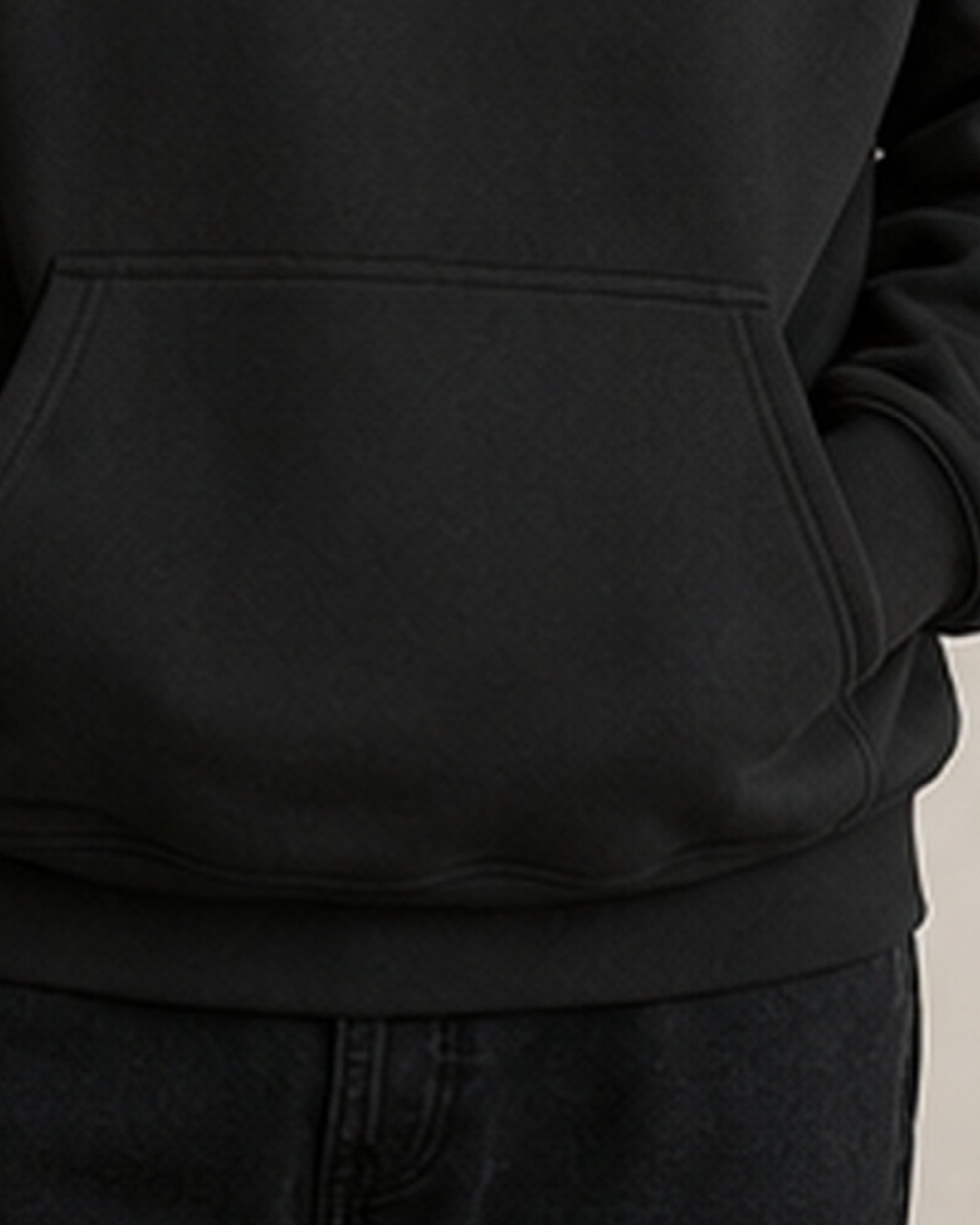 The Typese INFJ Gildan hoodie in black, hem pocket detail