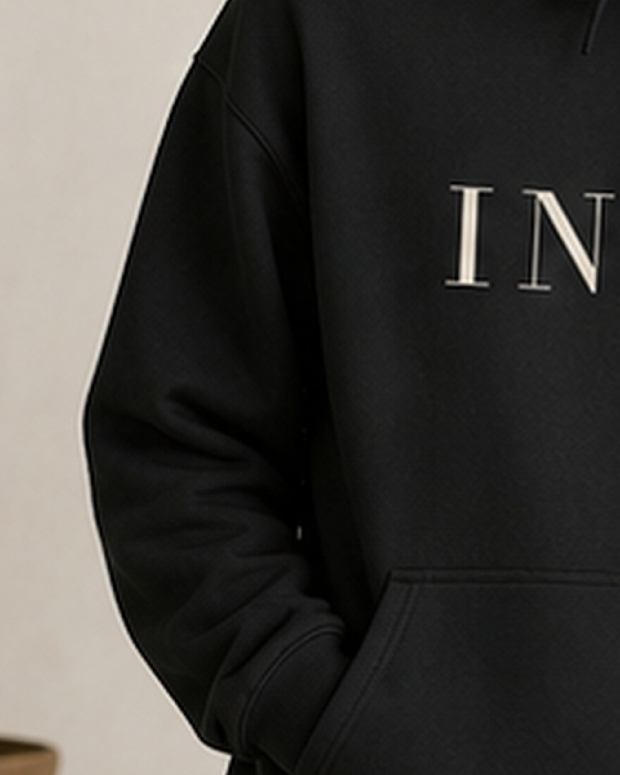 The Typese INFJ Gildan hoodie in black, sleeve detail