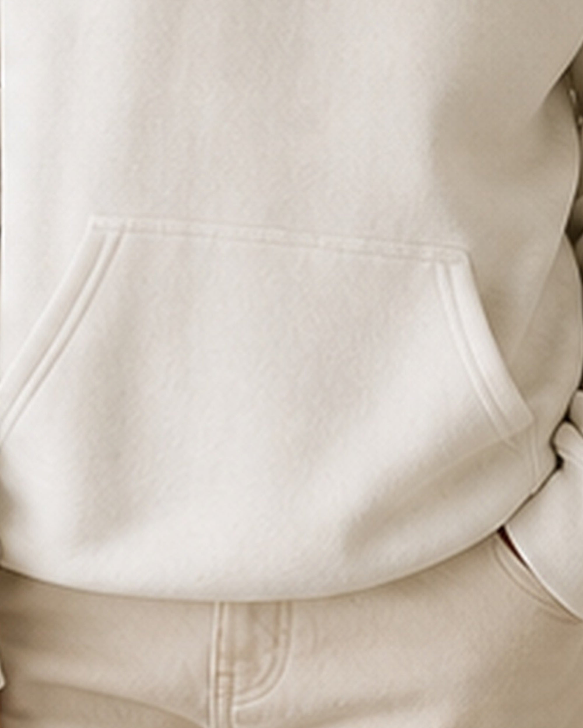 The Typese INFJ Gildan hoodie in white, hem pocket detail