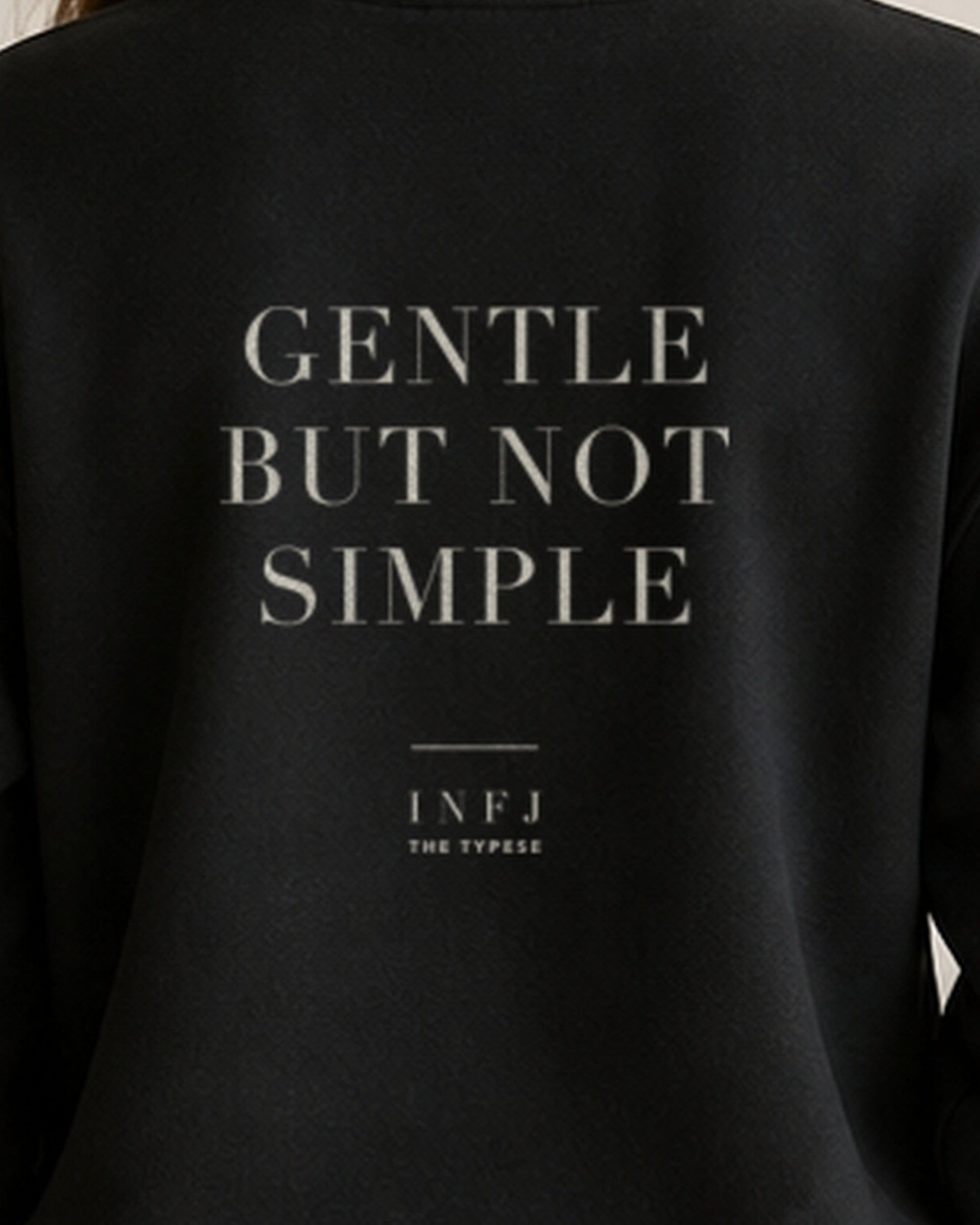 The Typese INFJ Gildan crewneck sweatshirt in black, female back print close