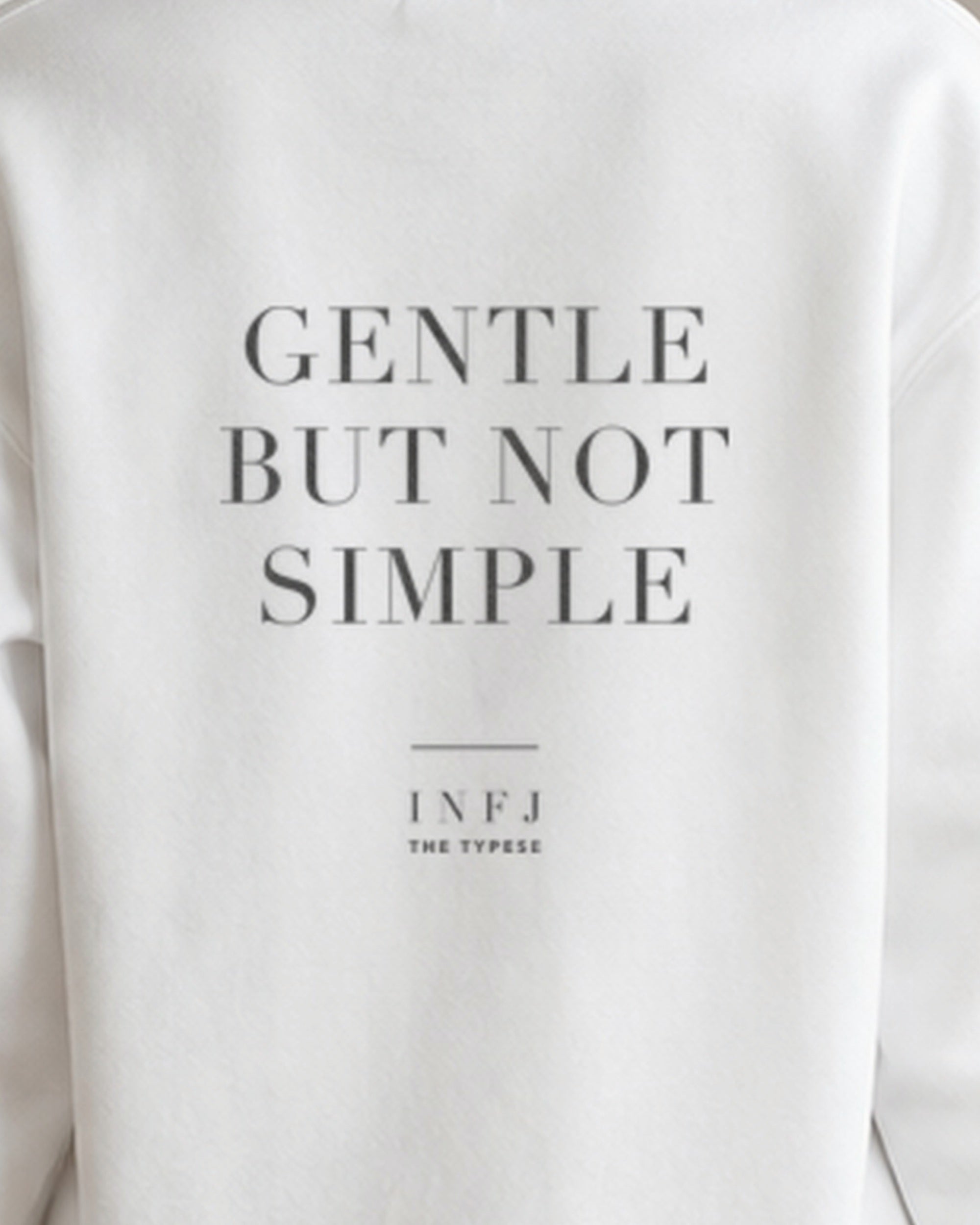 The Typese INFJ Gildan crewneck sweatshirt in white, female back print close v7
