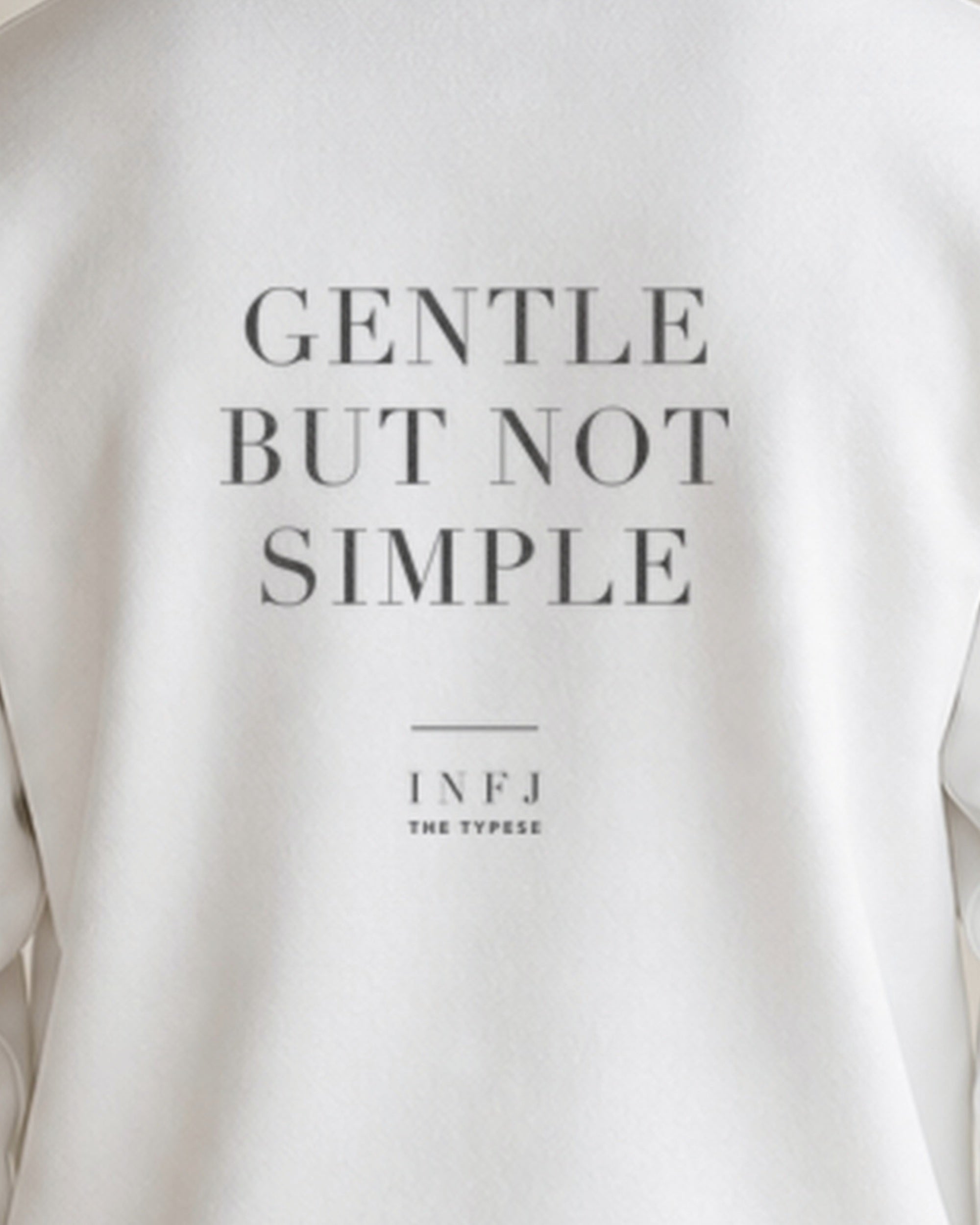 The Typese INFJ Gildan crewneck sweatshirt in white, male back print close v7
