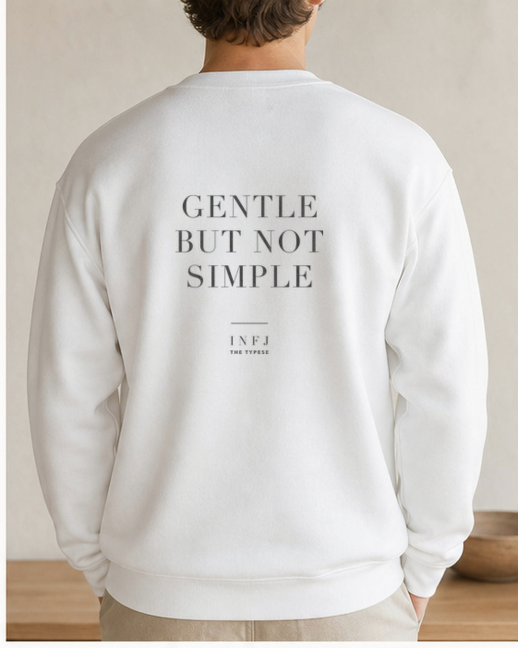The Typese INFJ Gildan crewneck sweatshirt in white, male back v7