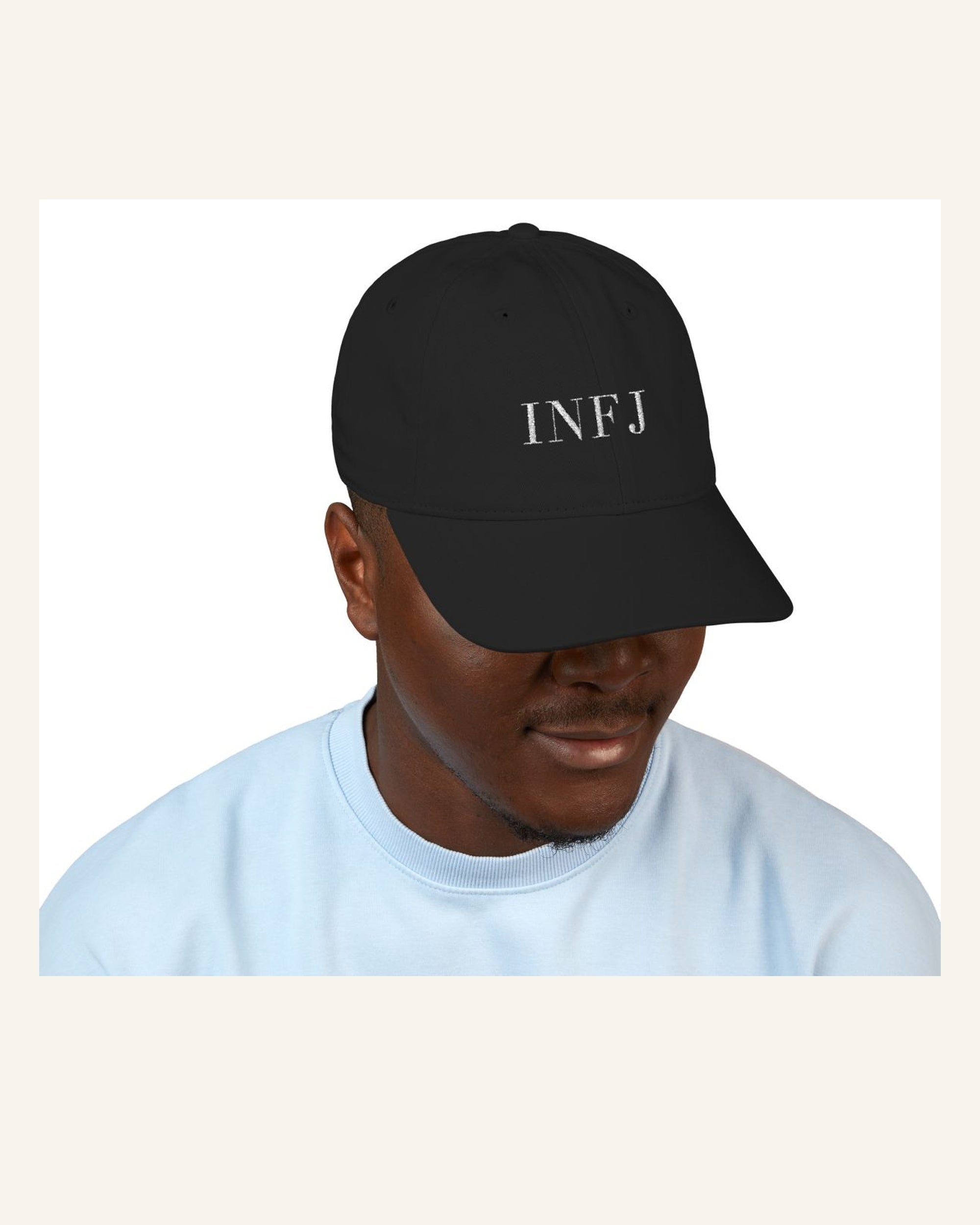 INFJ black organic baseball cap model front product photo