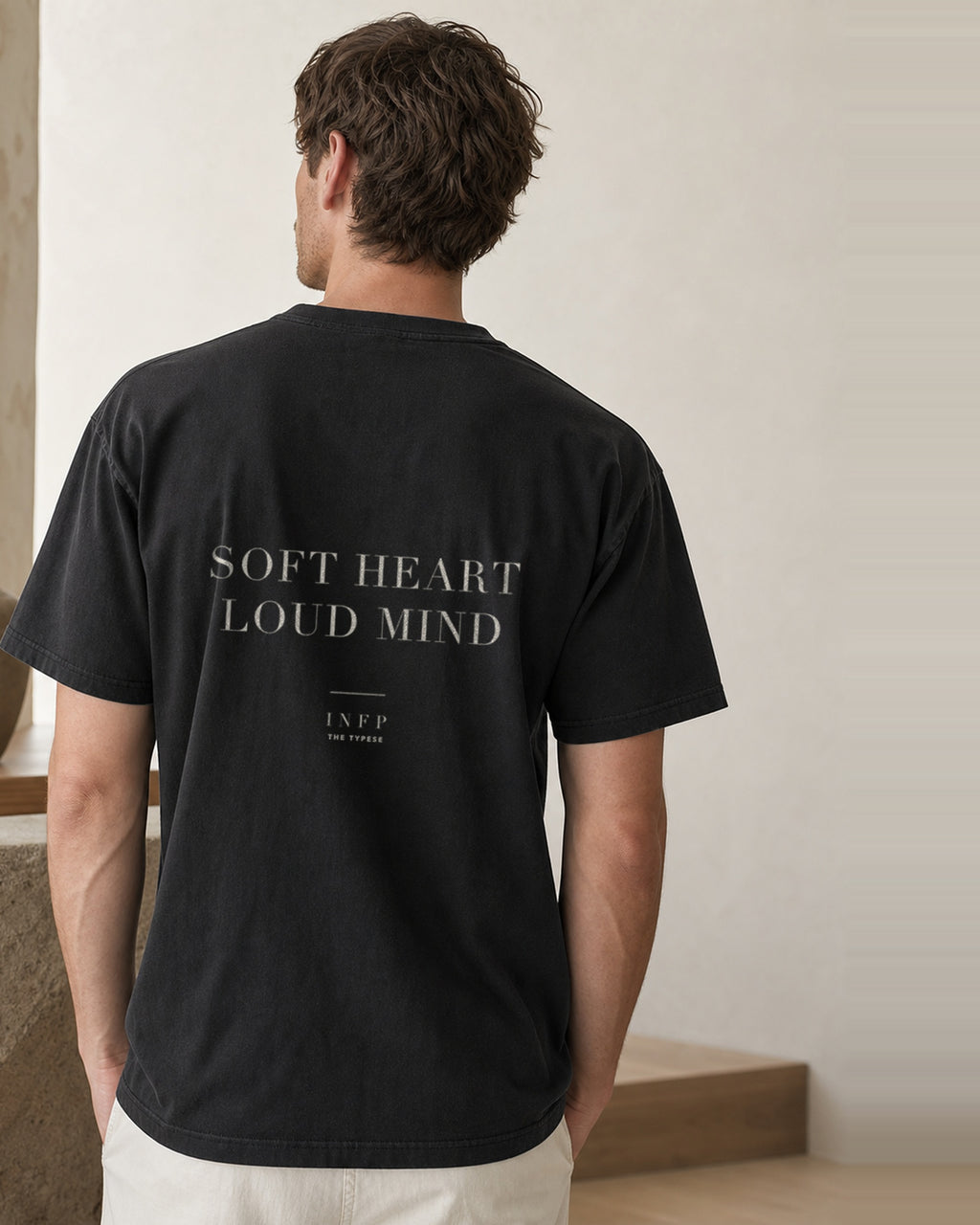 The Typese INFP Comfort Colors Tee in black, male back