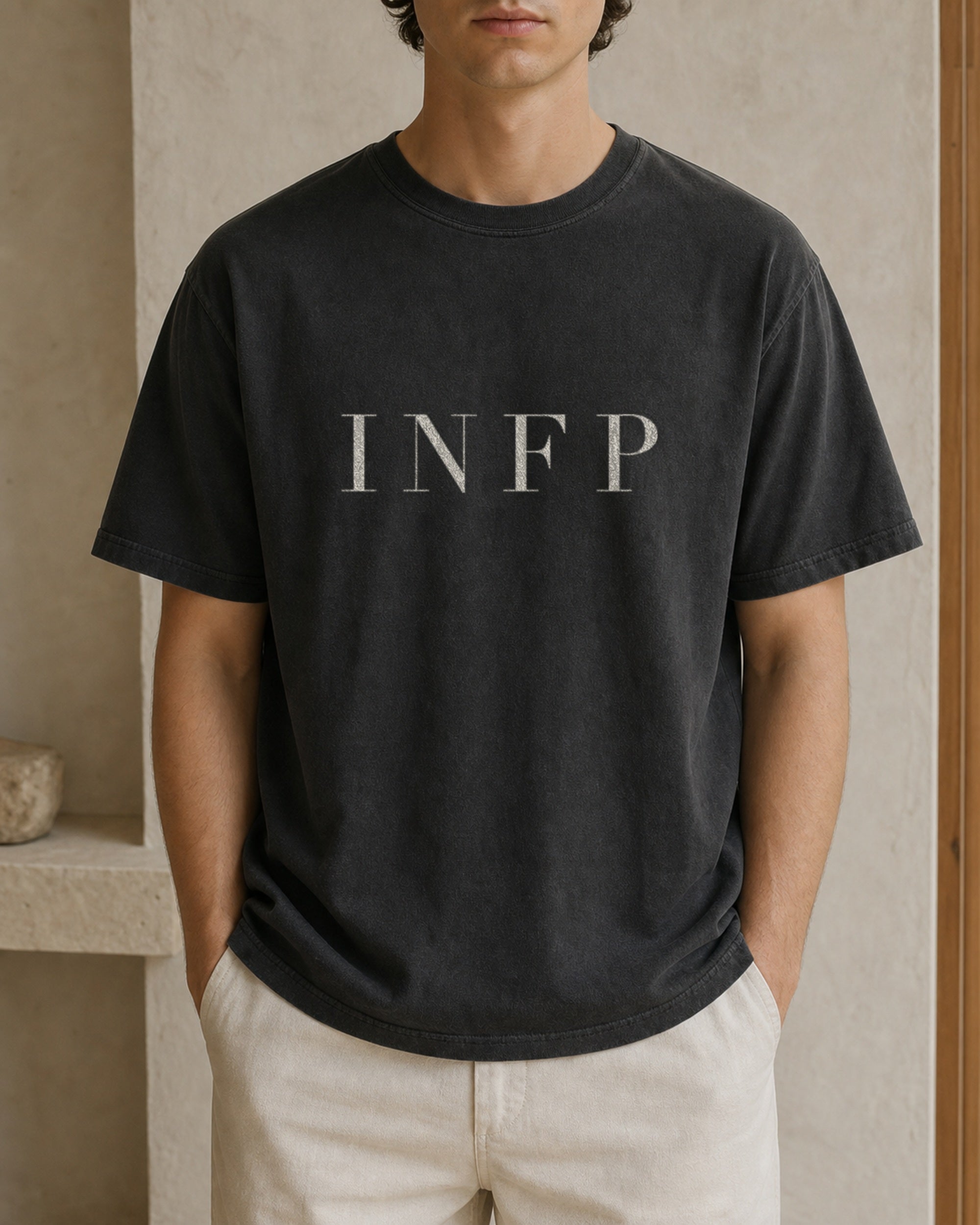 The Typese INFP Comfort Colors Tee in black, male front